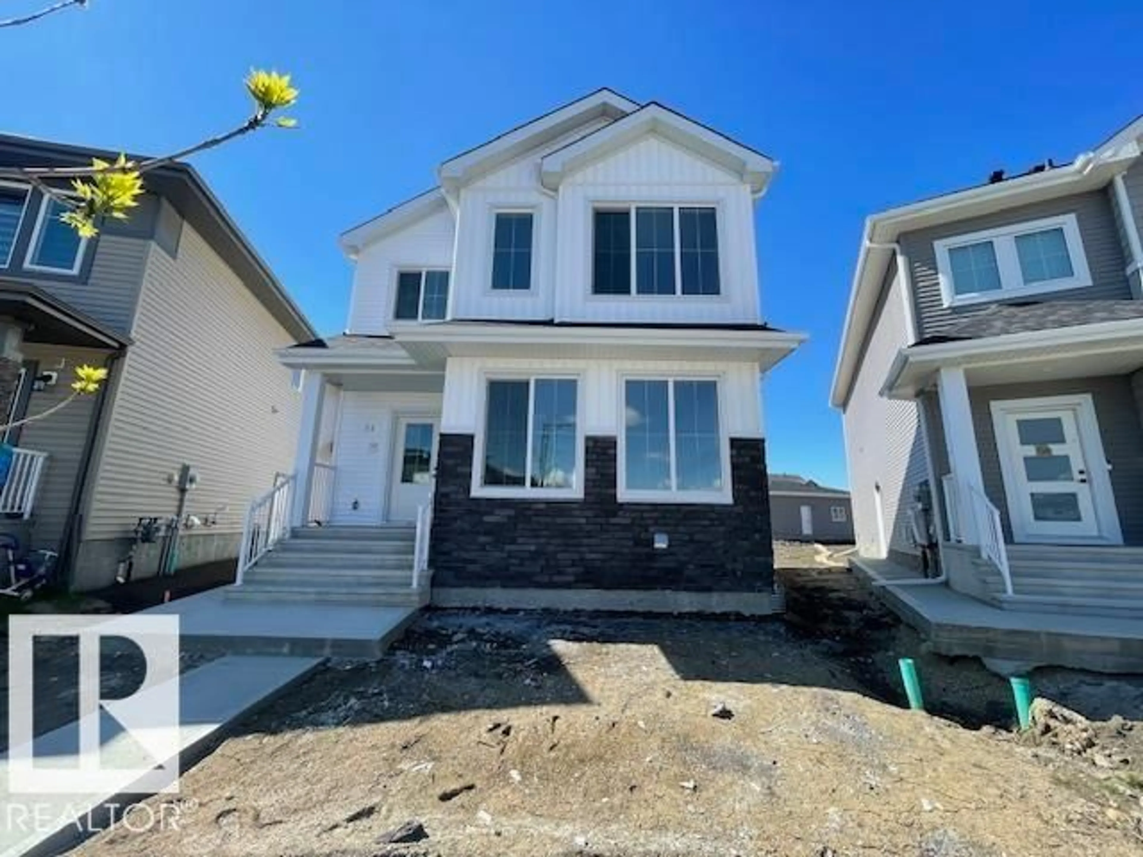 Home with vinyl exterior material, street for 54 EDEN LI, Fort Saskatchewan Alberta T8L0Z2