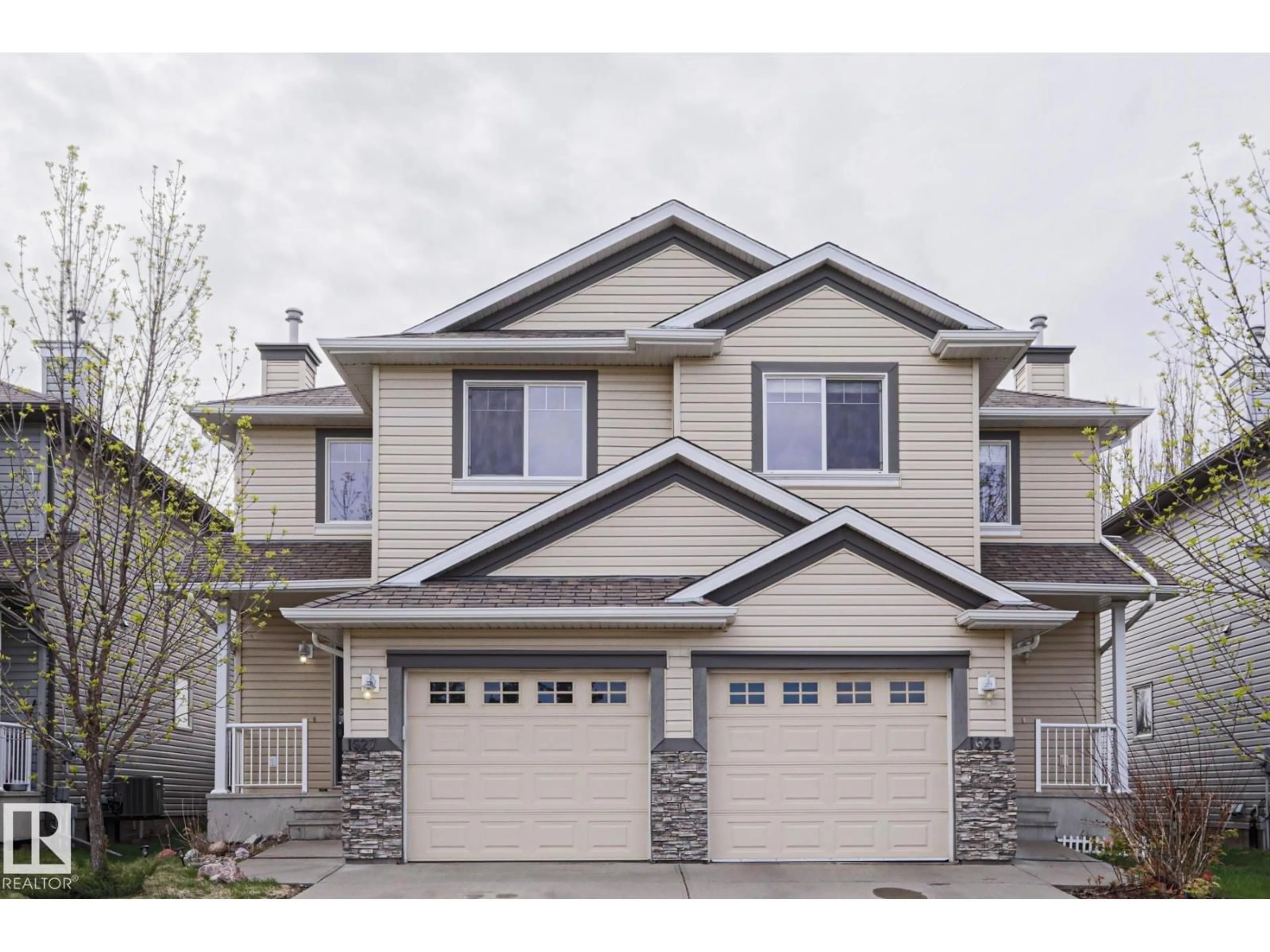Home with vinyl exterior material, street for SW SW - 1627 MELROSE PL, Edmonton Alberta T6W1X5