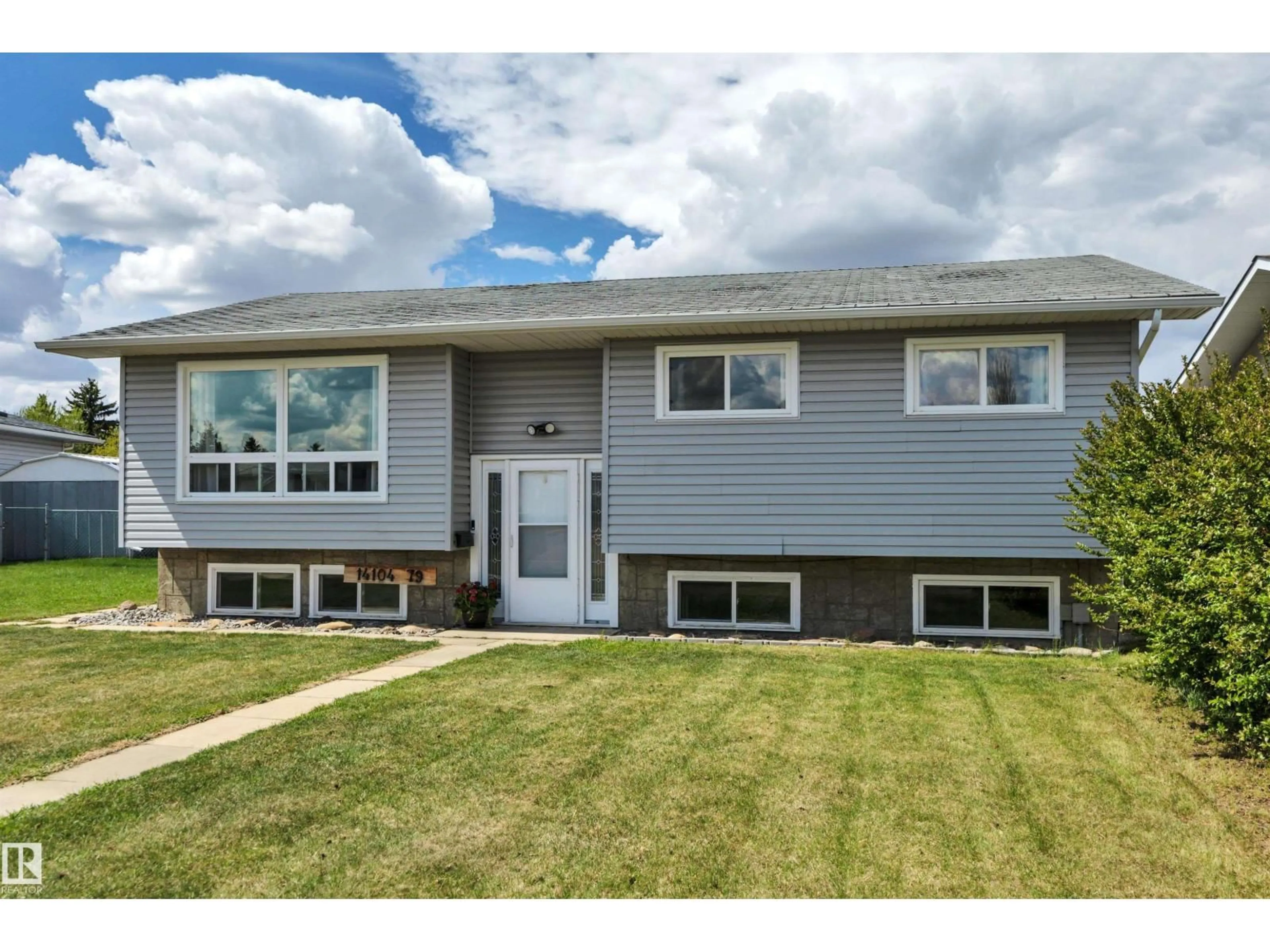 Home with vinyl exterior material, street for NW - 14104 79 ST, Edmonton Alberta T5C1K1