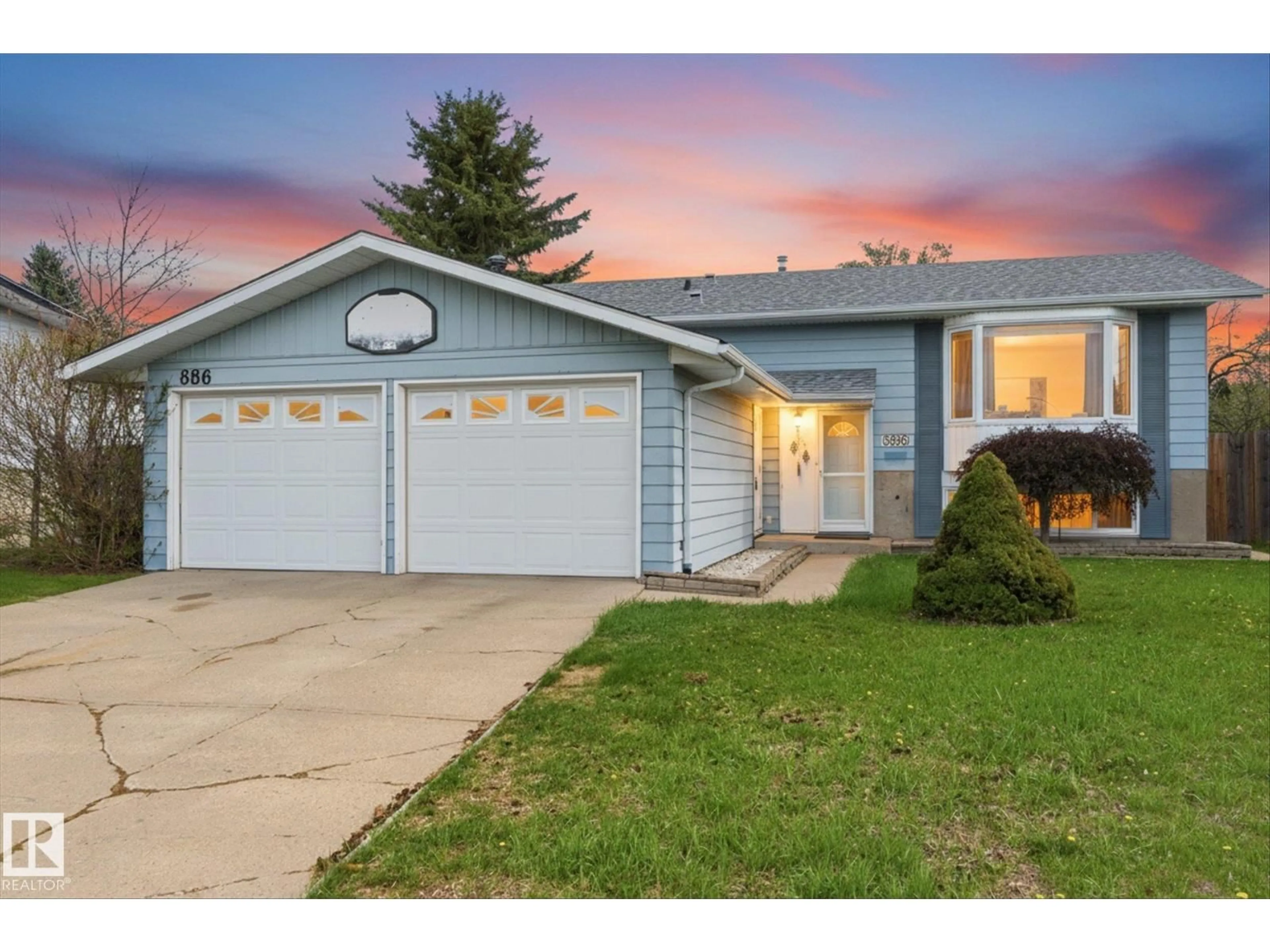 Home with vinyl exterior material, street for 886 KNOTTWOOD RD, Edmonton Alberta T6K3C3