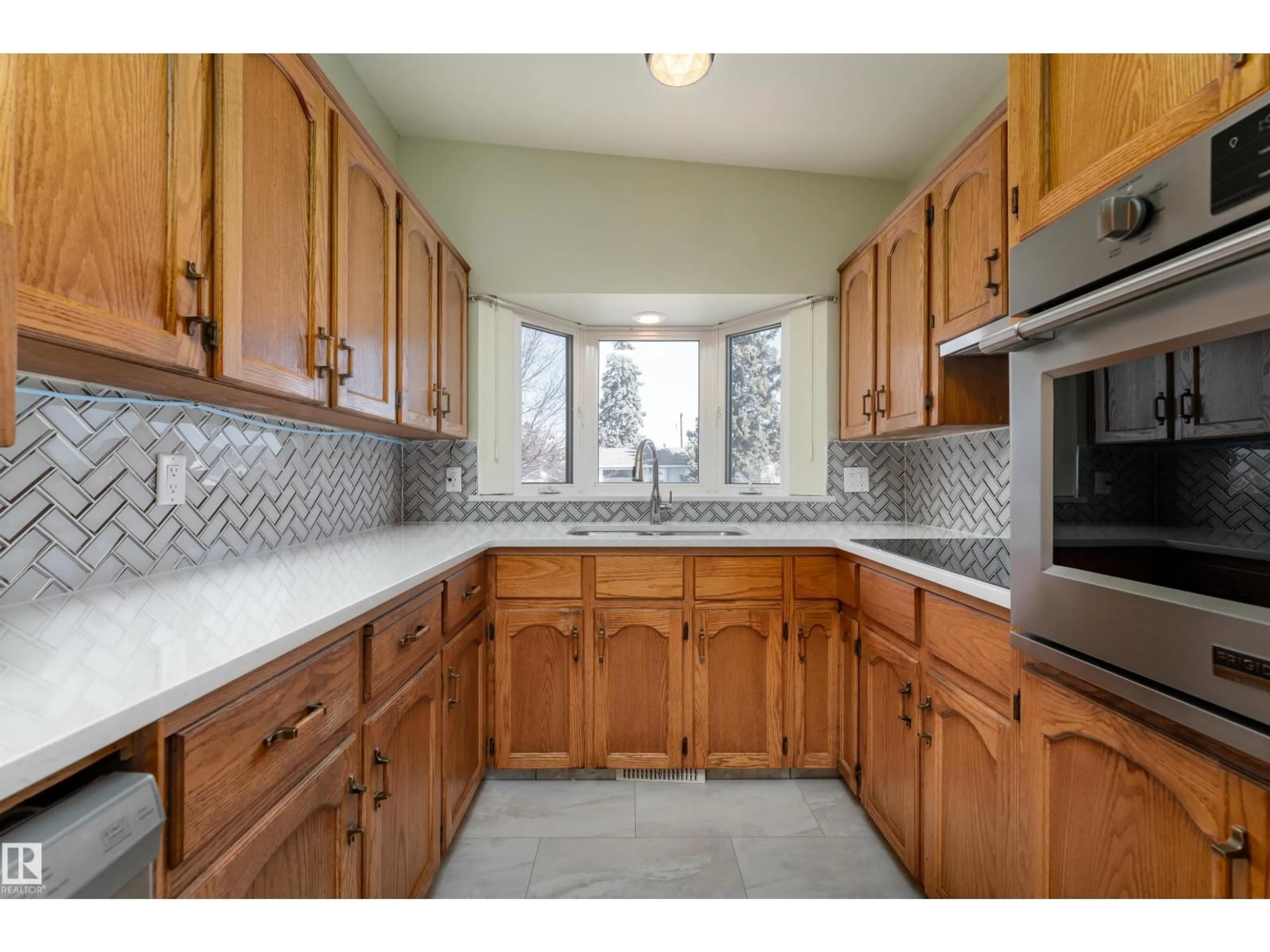 Standard kitchen, ceramic/tile floor for 9523 134 AV, Edmonton Alberta T5E1H8