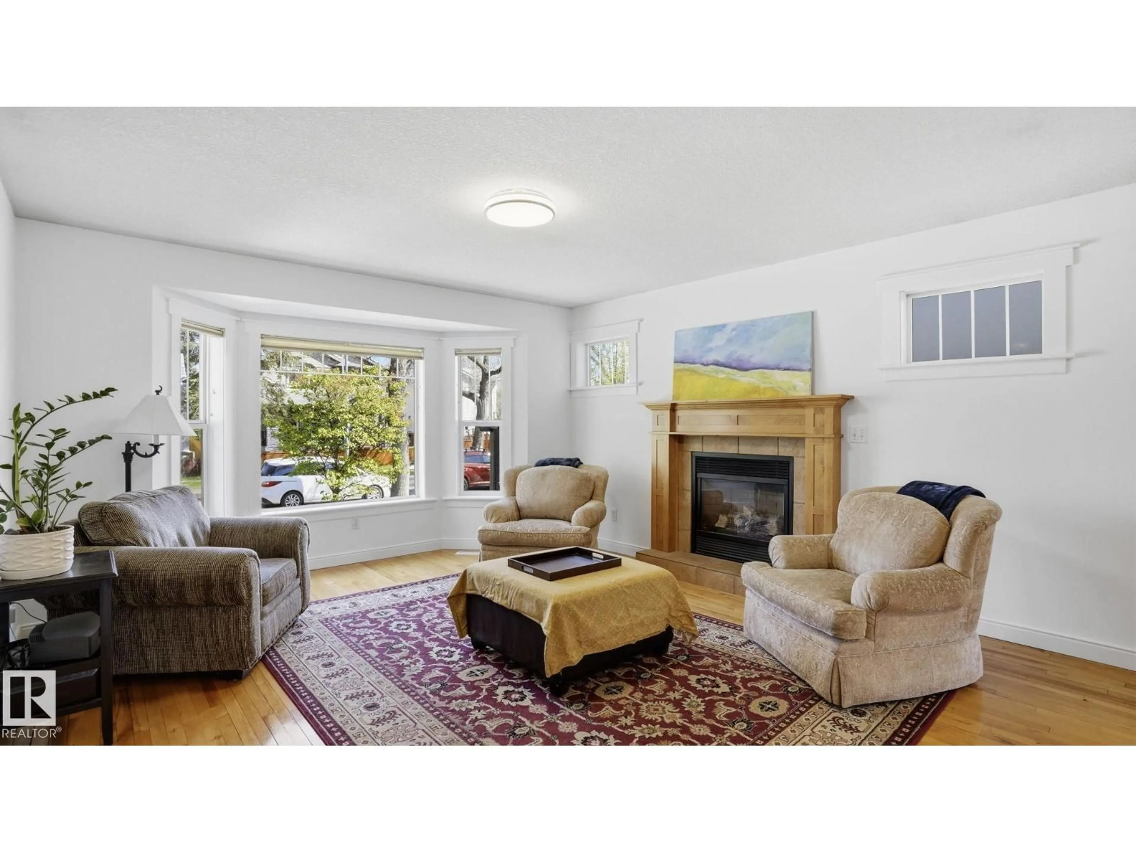Living room with furniture, unknown for 9611 77 AV NW, Edmonton Alberta T6C0M4