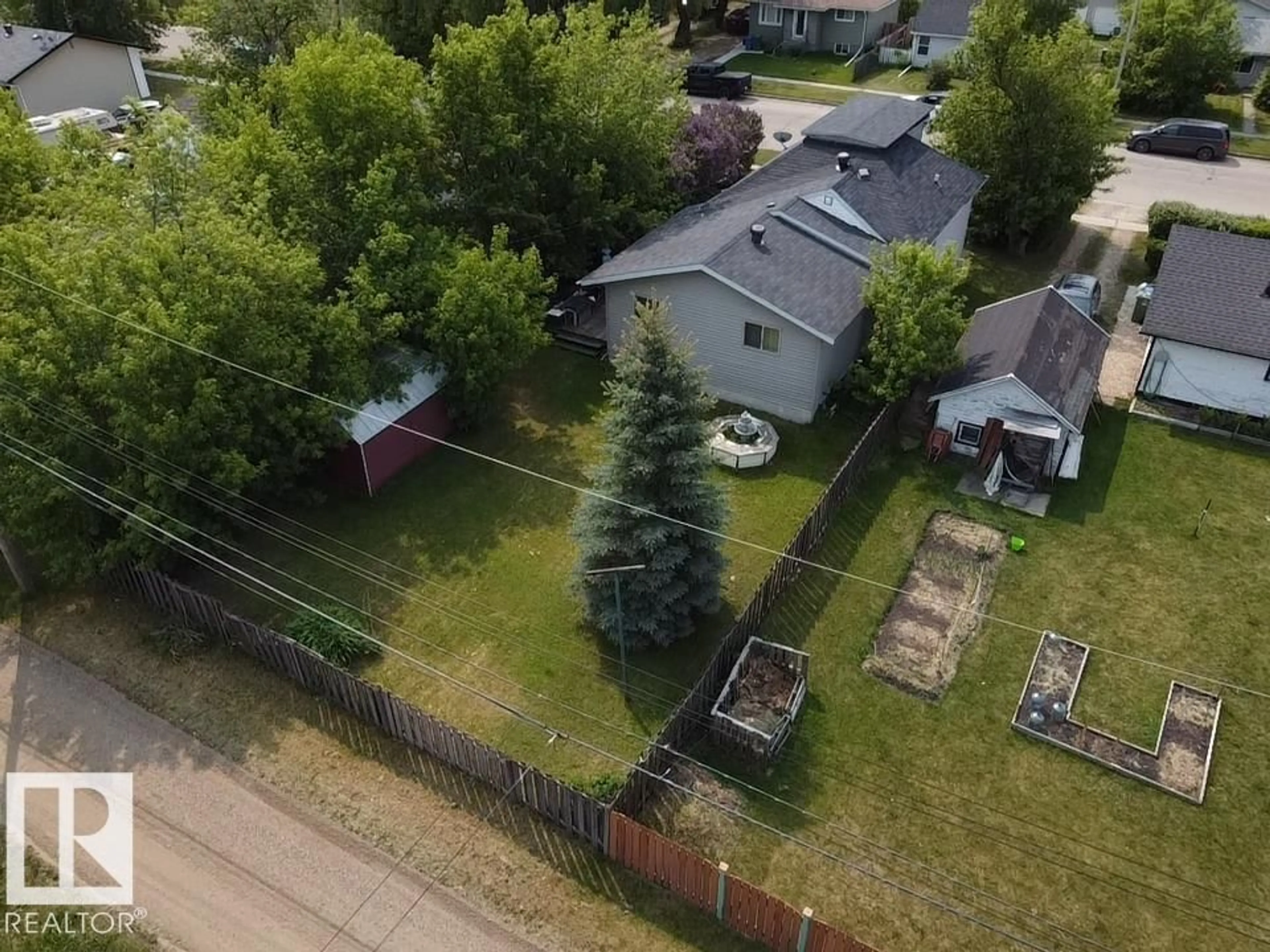 A pic from outside/outdoor area/front of a property/back of a property/a pic from drone, unknown for 4612 47 AV, Wetaskiwin Alberta T9A0J4