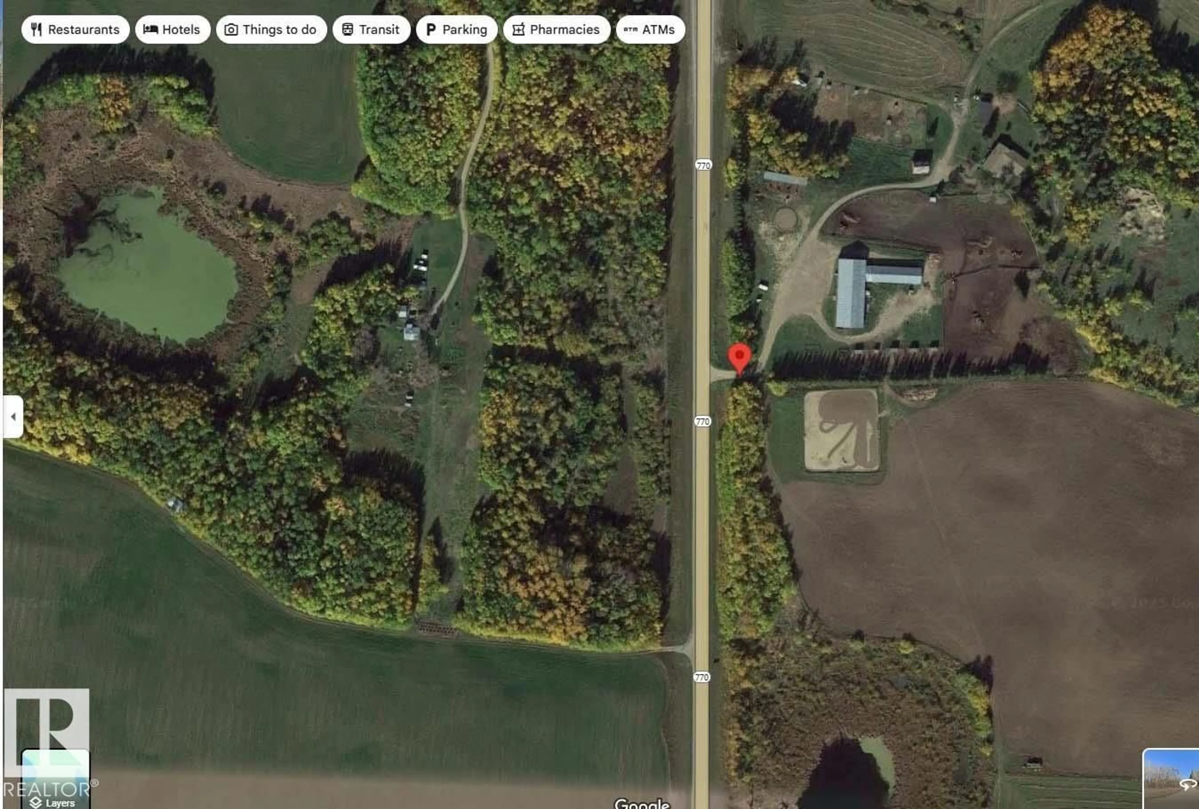 A pic from outside/outdoor area/front of a property/back of a property/a pic from drone, water/lake/river/ocean view for 51531 HIGHWAY 770, Rural Parkland County Alberta T7X1X5
