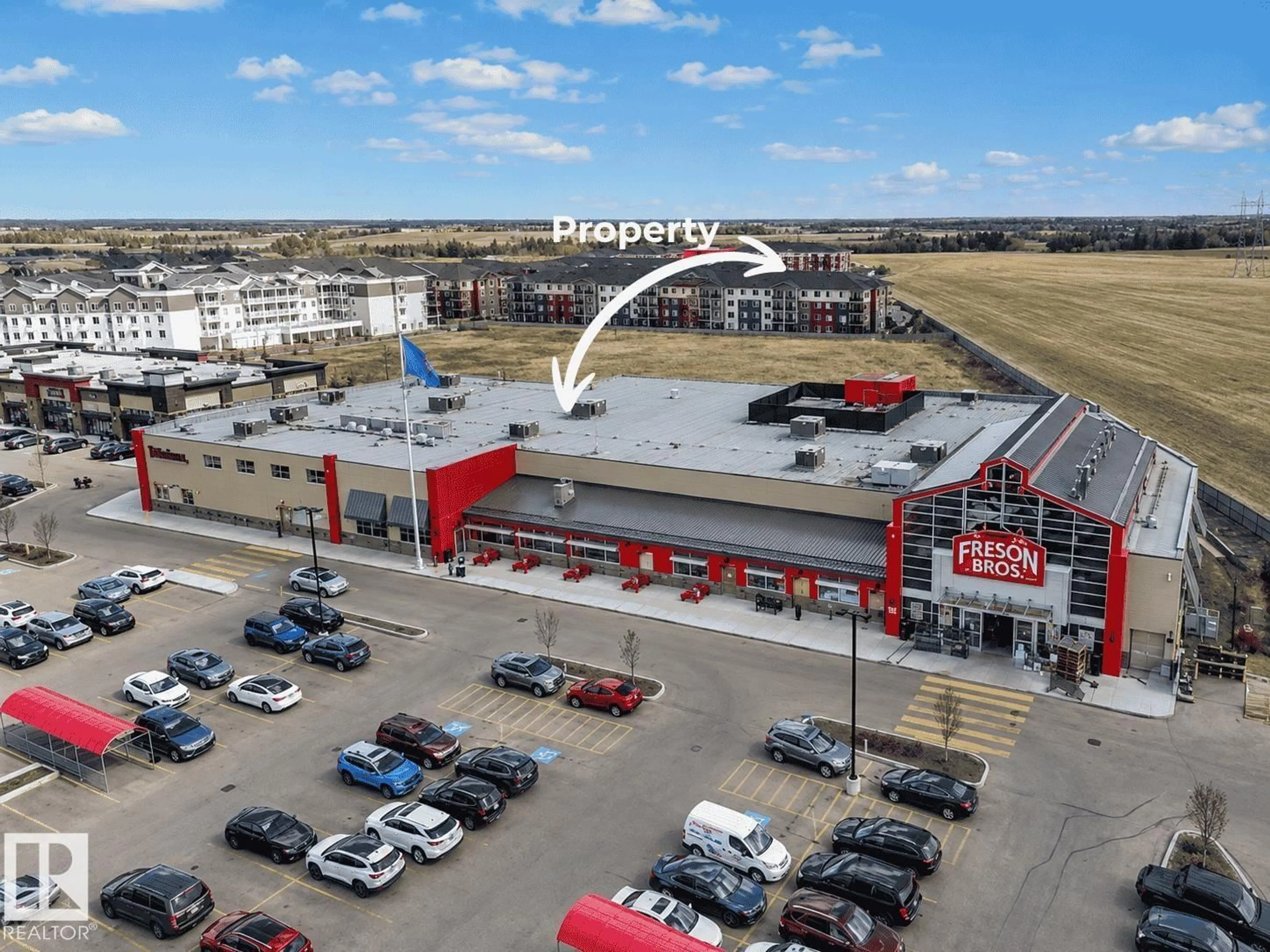 A pic from outside/outdoor area/front of a property/back of a property/a pic from drone, building for #422 - 5816 MULLEN PL, Edmonton Alberta T6R0W3
