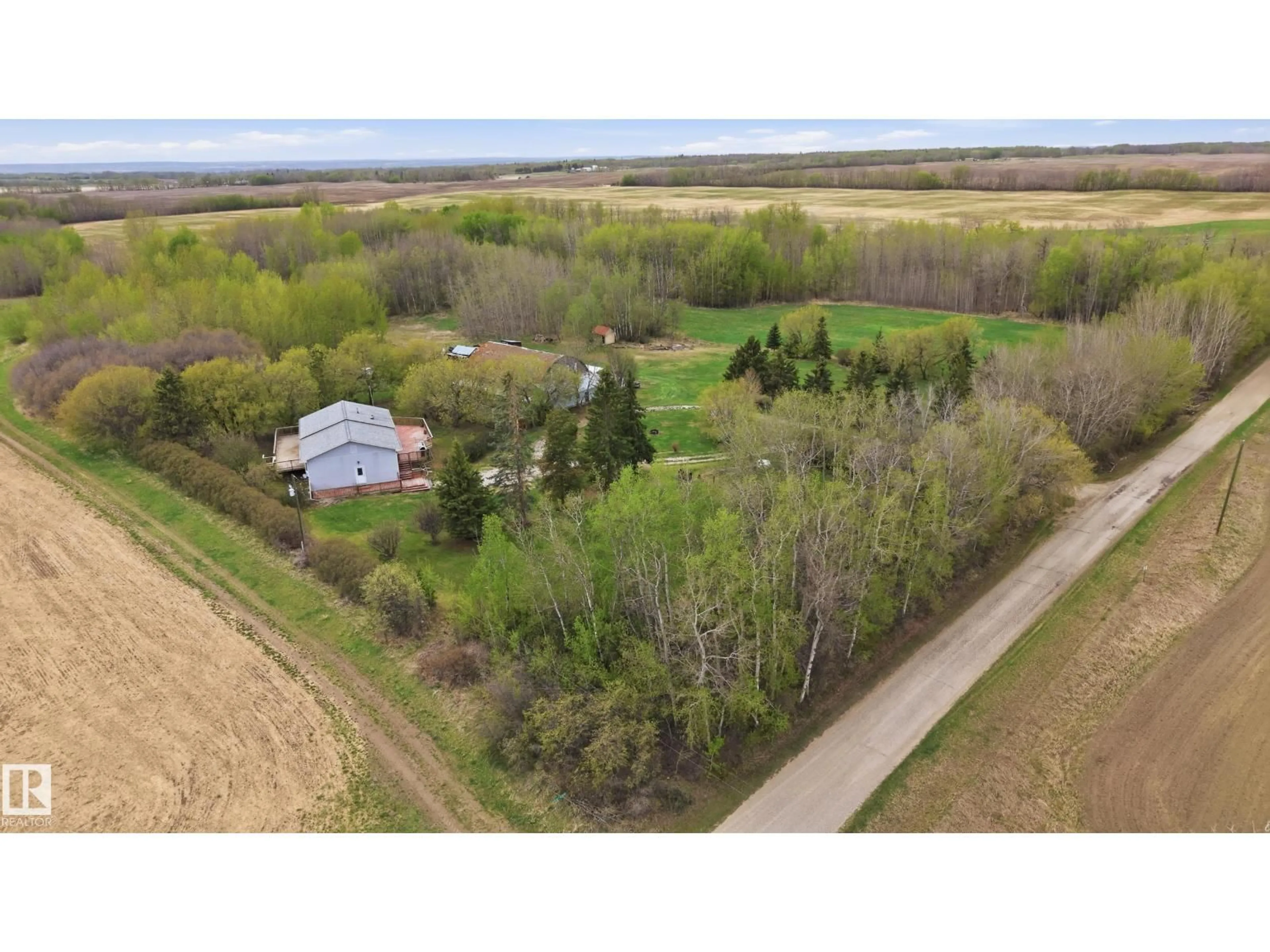 A pic from outside/outdoor area/front of a property/back of a property/a pic from drone, unknown for 51102 RGE ROAD 22, Rural Parkland County Alberta T7Y2H7