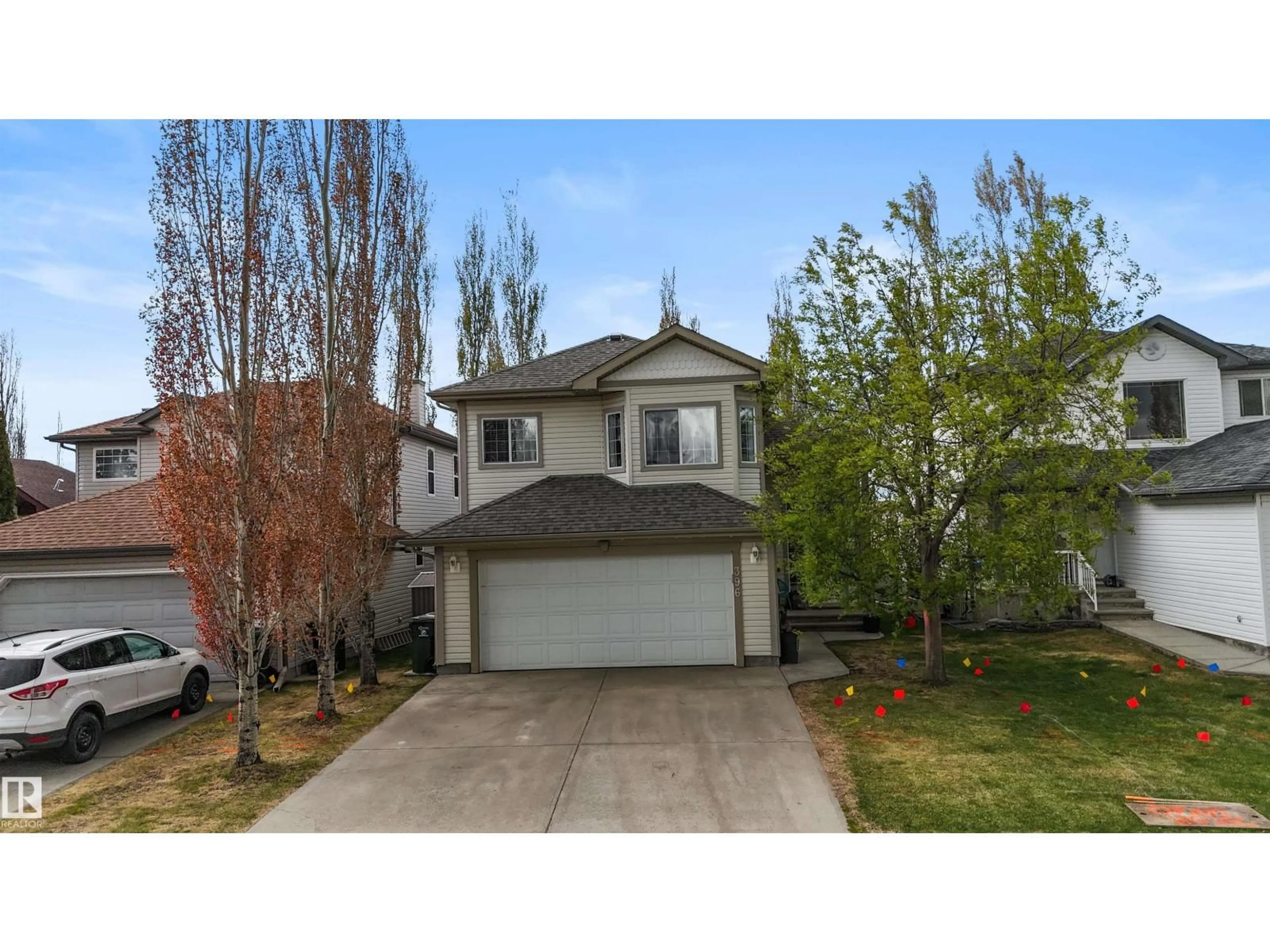 Home with vinyl exterior material, street for 396 KANANASKIS WY, Devon Alberta T9G2C4
