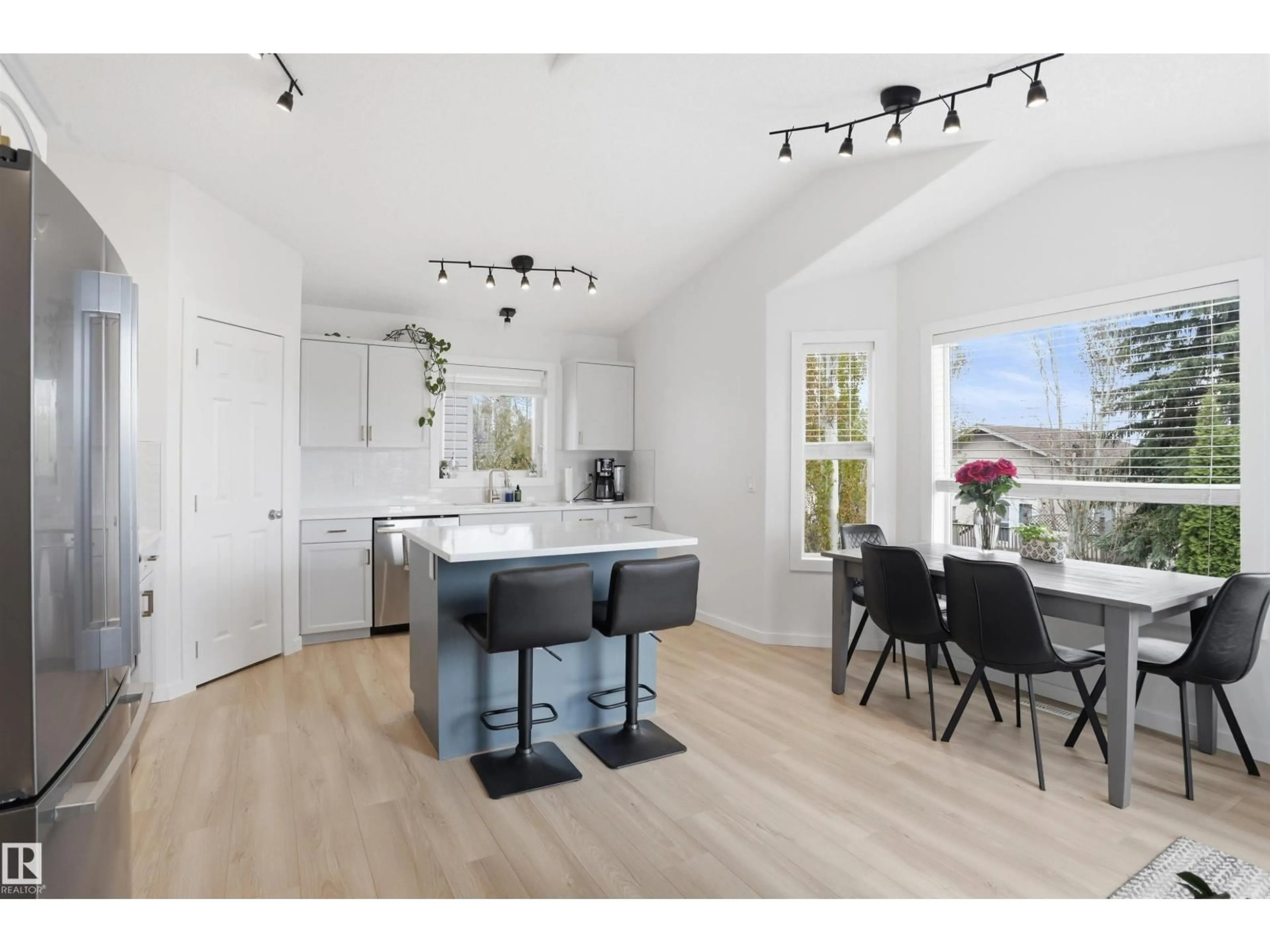 Open concept kitchen, wood/laminate floor for 396 KANANASKIS WY, Devon Alberta T9G2C4