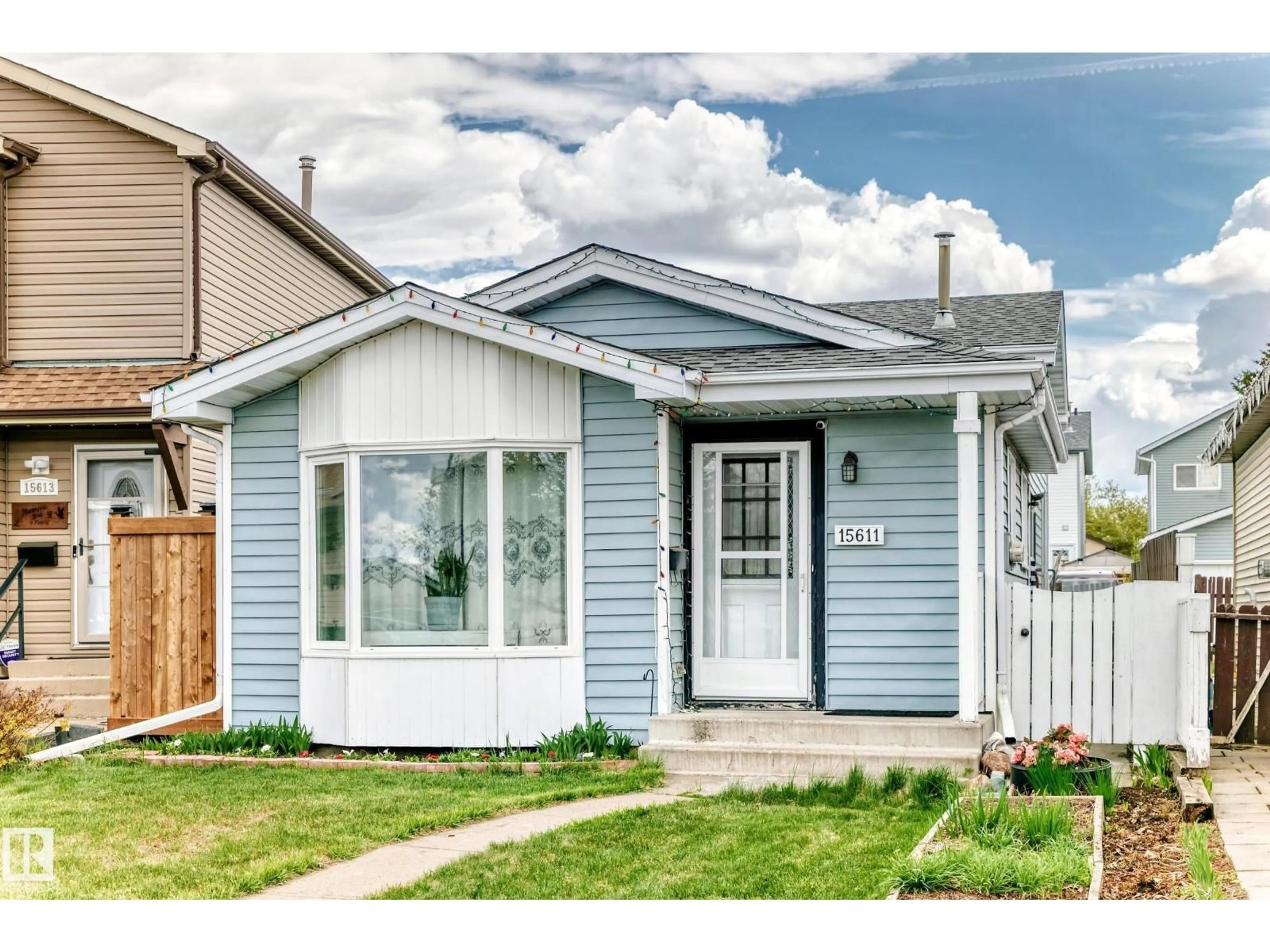 Home with vinyl exterior material, street for NW - 15611 83A ST, Edmonton Alberta T5Z2R6