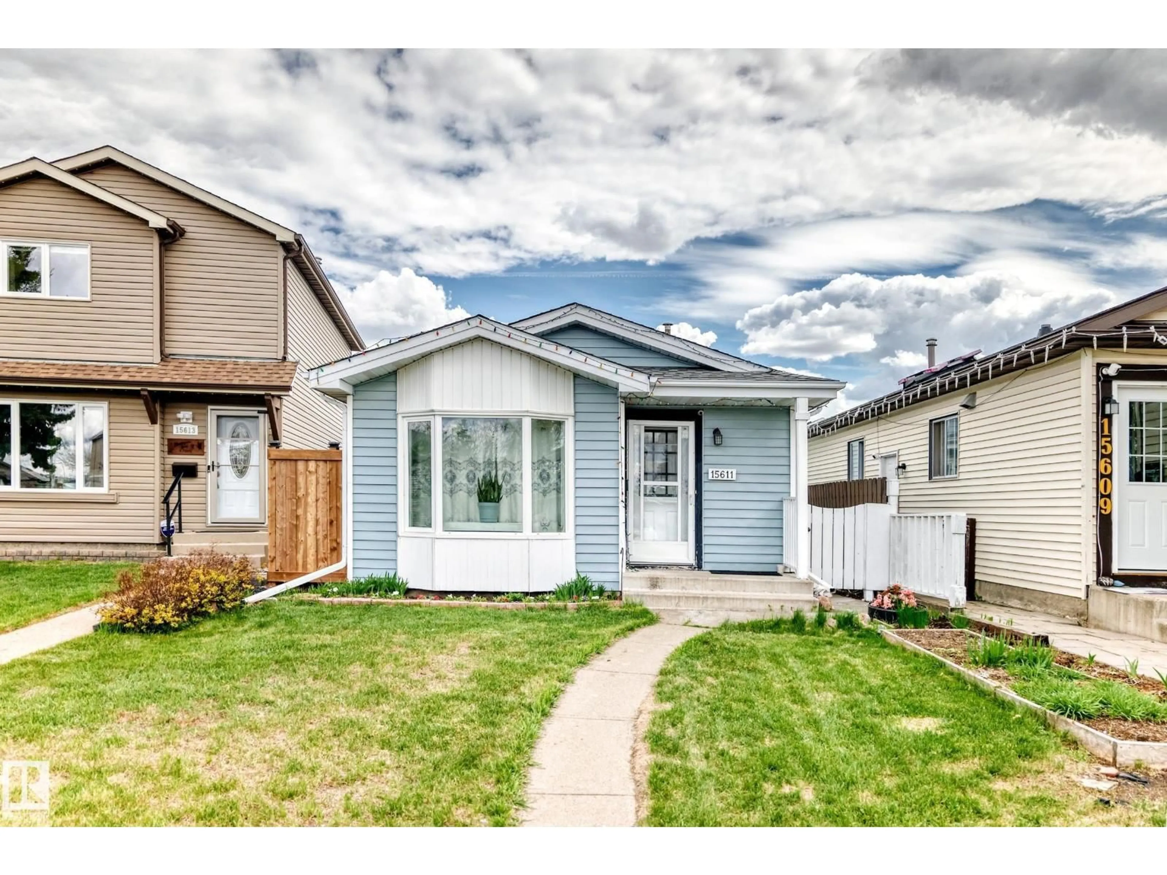Home with vinyl exterior material, street for NW - 15611 83A ST, Edmonton Alberta T5Z2R6