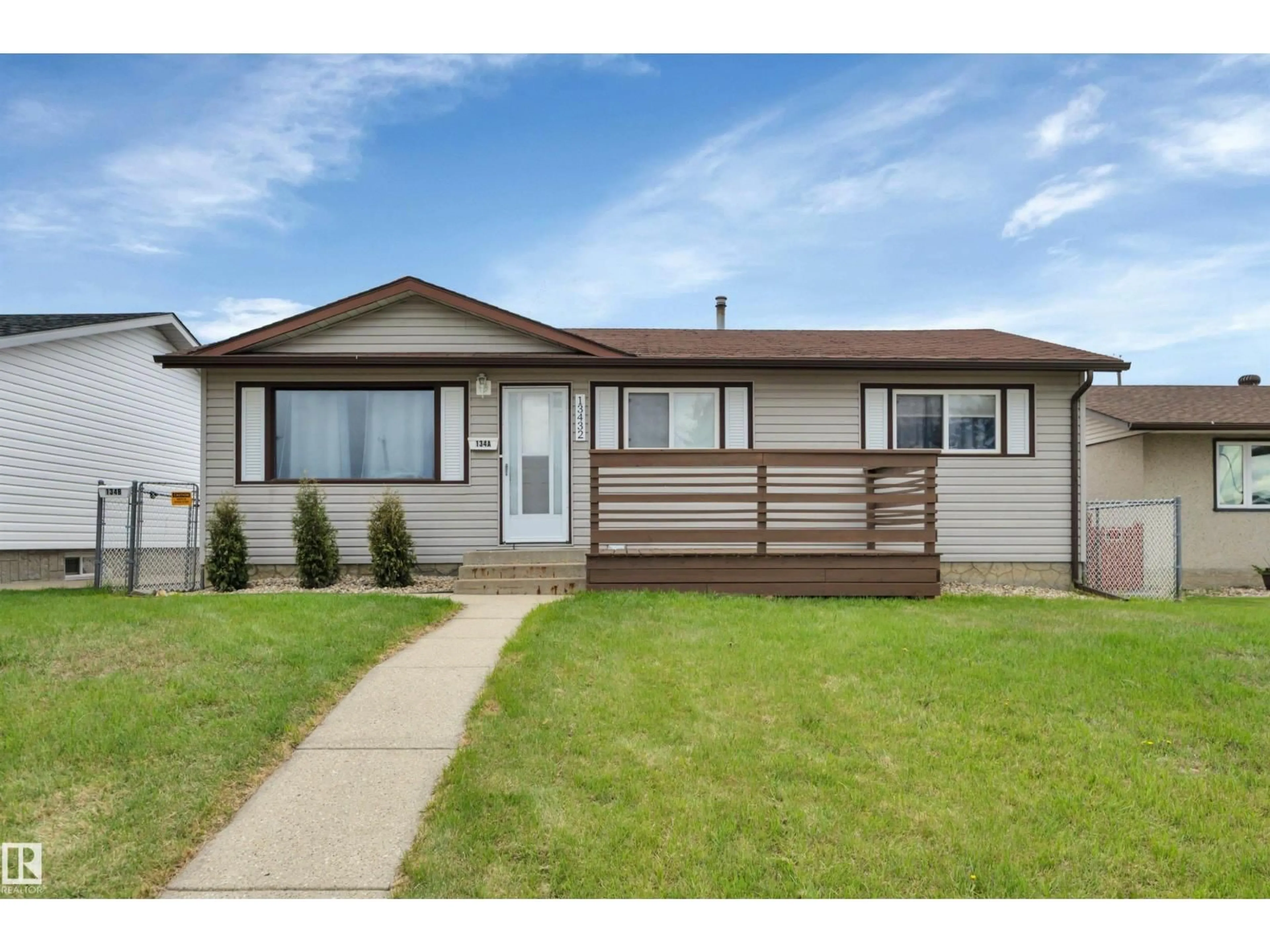 Home with vinyl exterior material, street for NW - 13432 58 ST, Edmonton Alberta T5A0R3