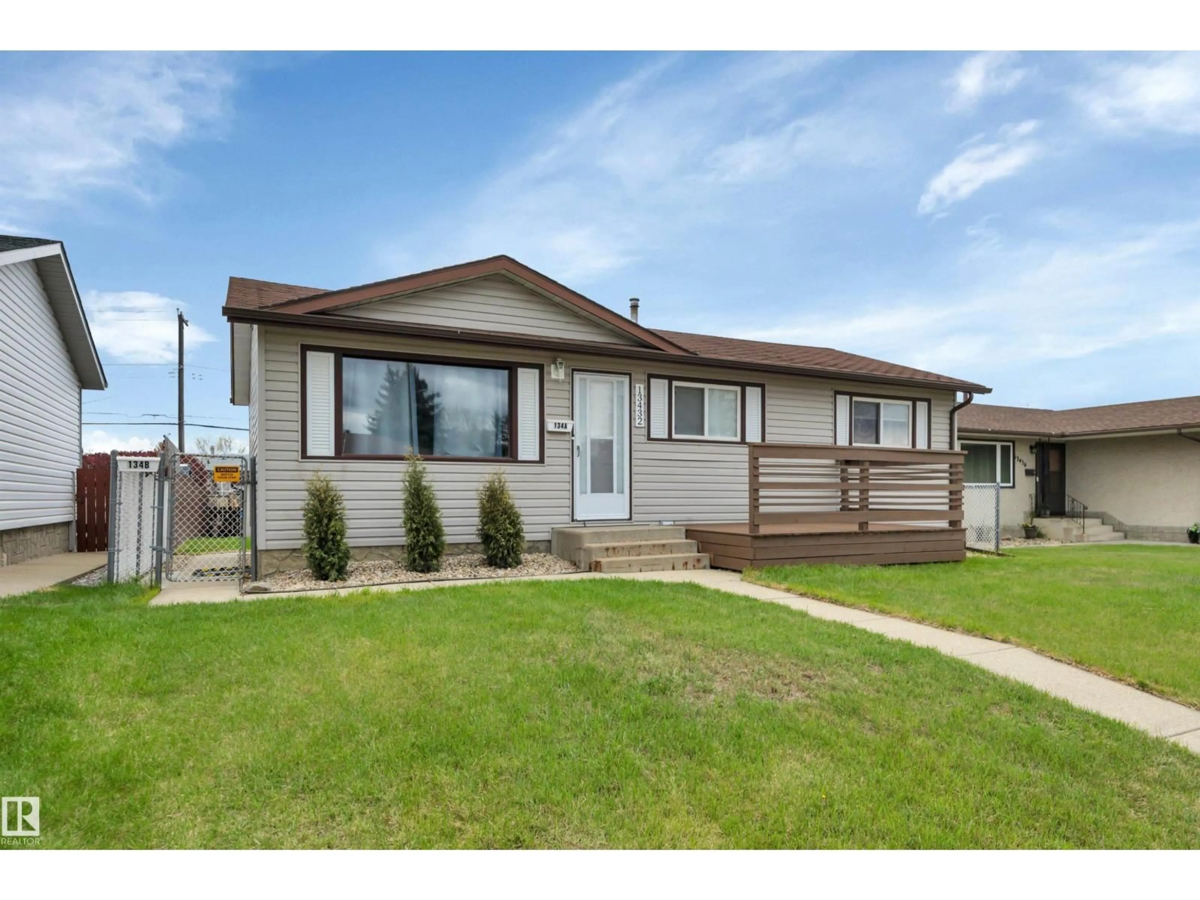 Home with vinyl exterior material, street for NW - 13432 58 ST, Edmonton Alberta T5A0R3