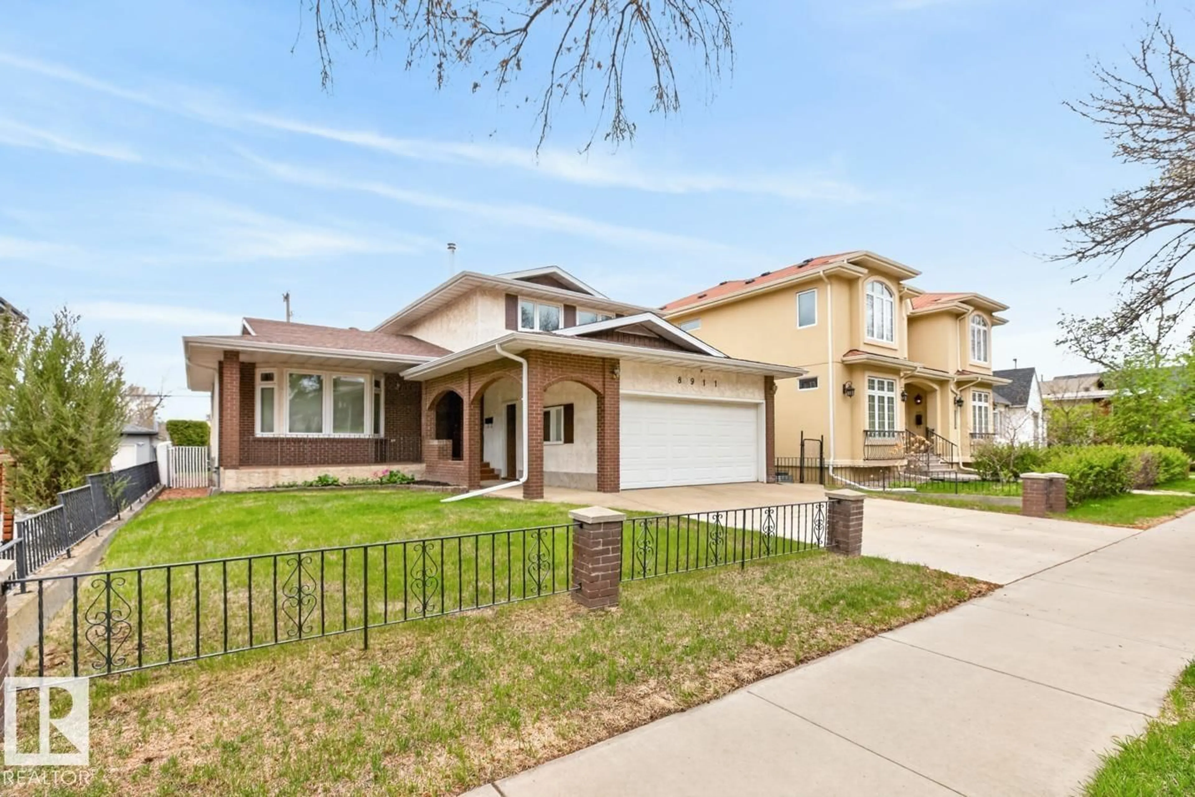 Home with brick exterior material, street for 8911 84 AV, Edmonton Alberta T6C1E3