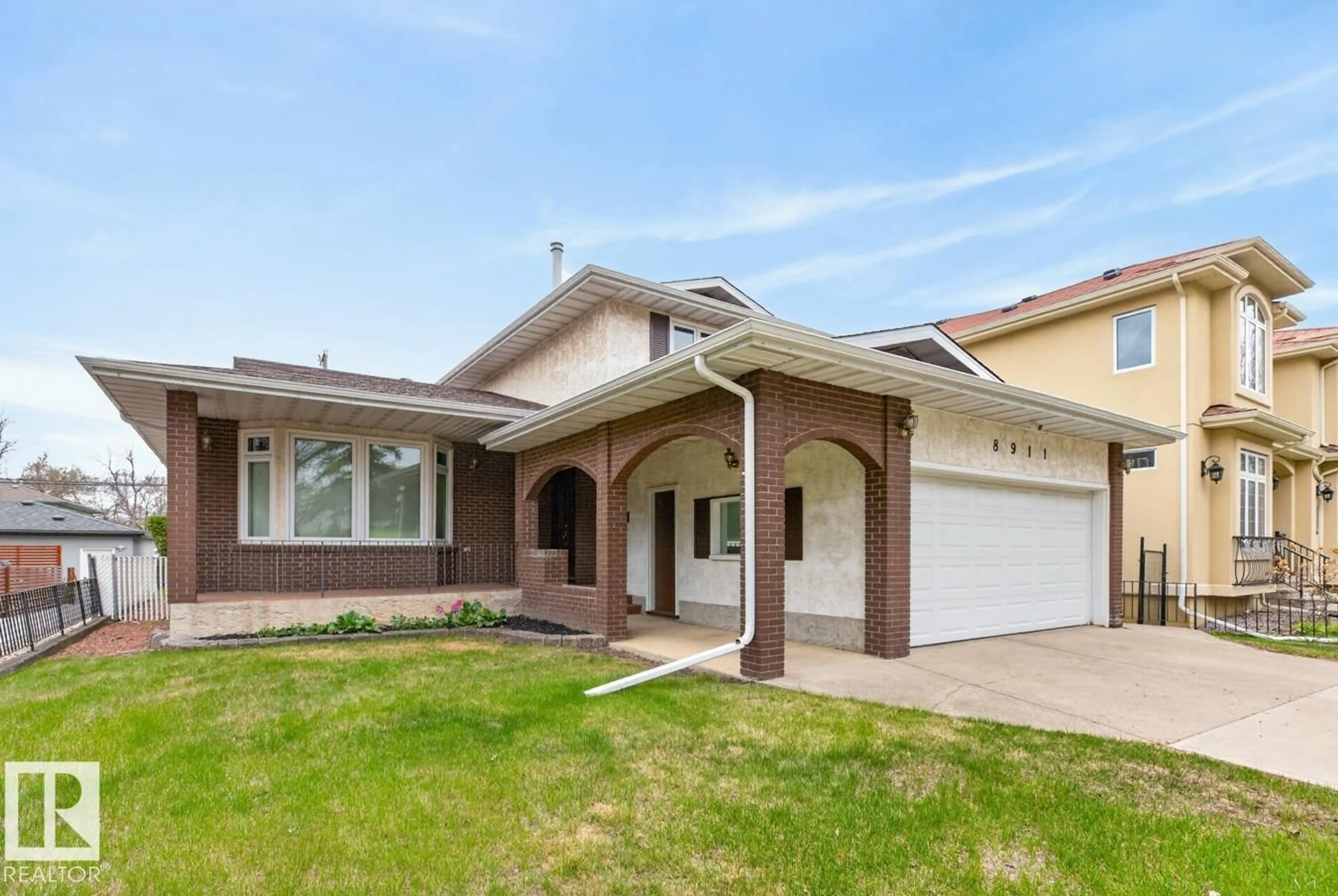 Home with brick exterior material, street for 8911 84 AV, Edmonton Alberta T6C1E3