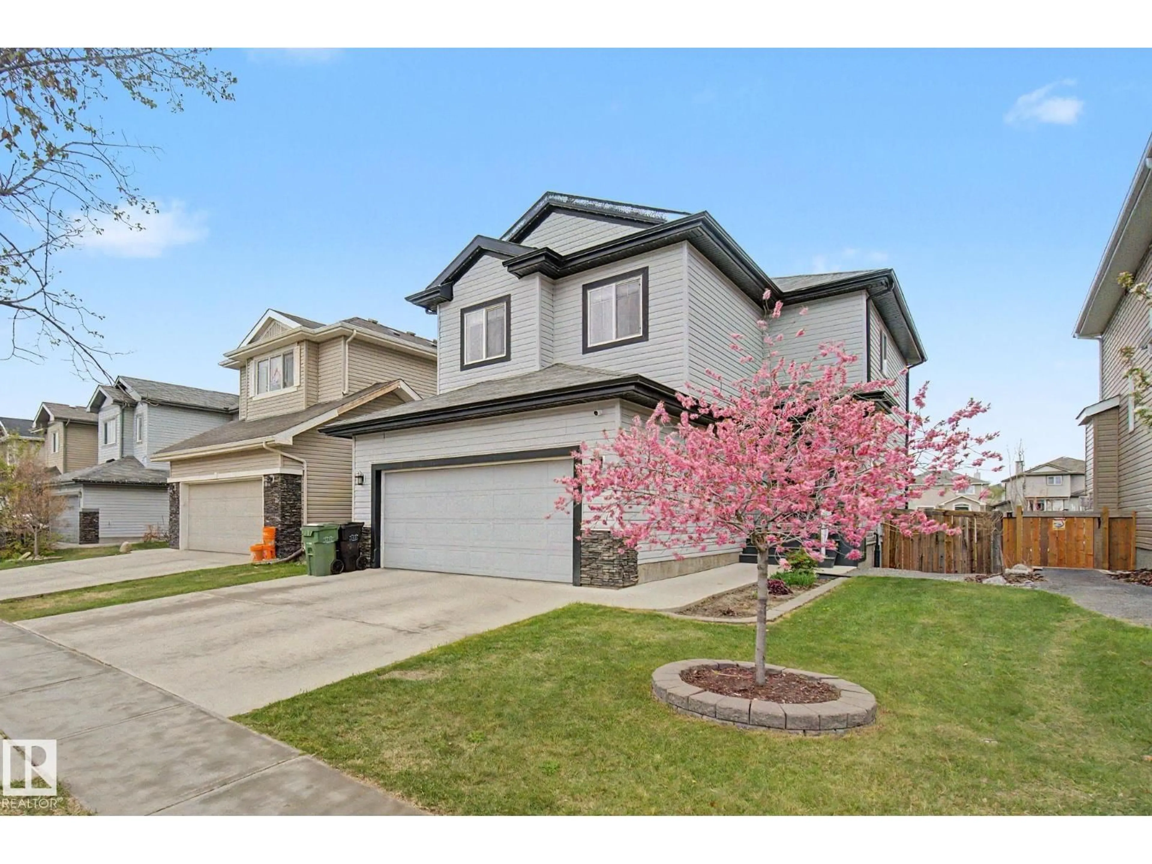 Home with vinyl exterior material, street for 82 DALQUIST BA, Leduc Alberta T9E0J7