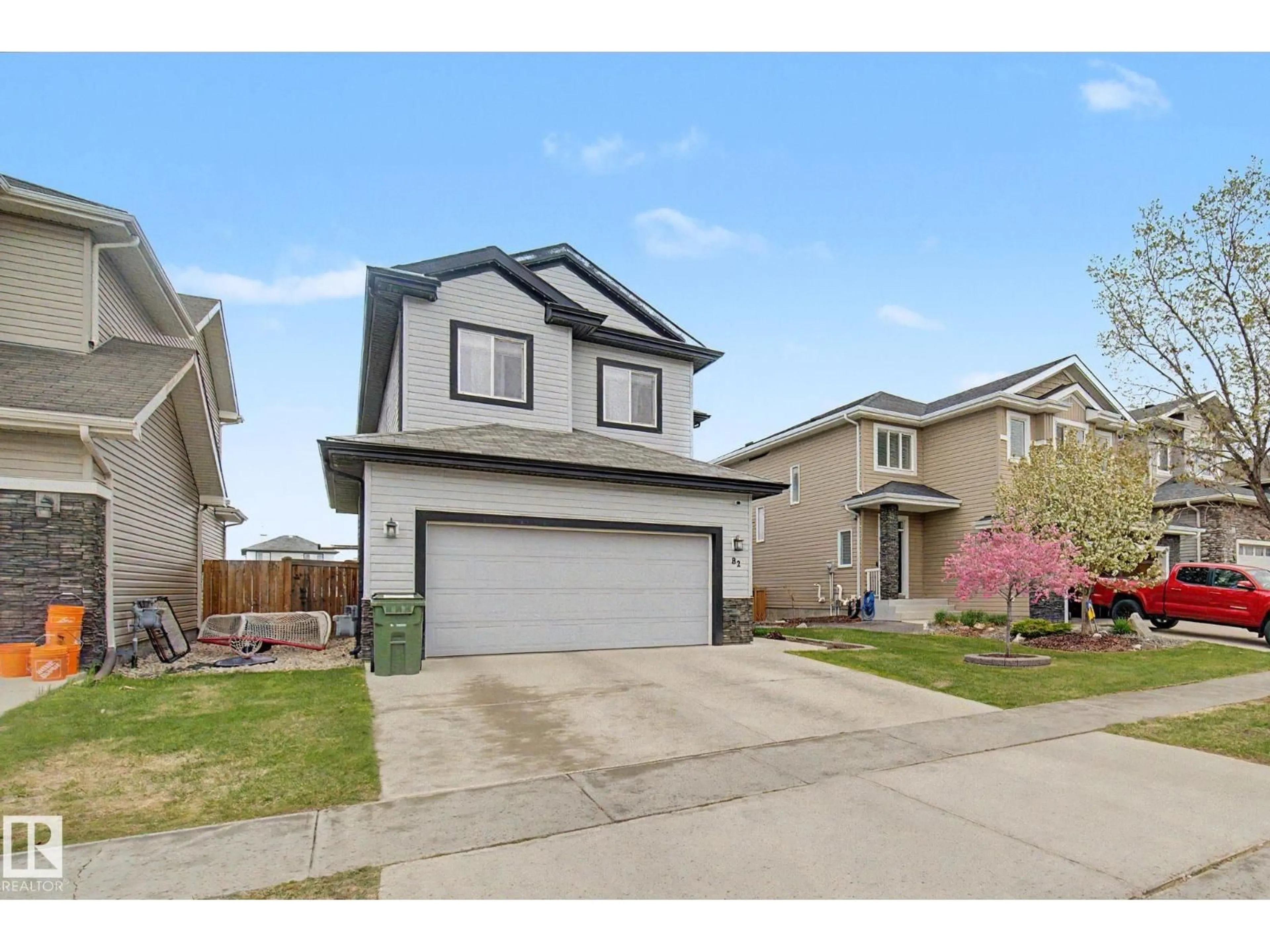 Home with vinyl exterior material, street for 82 DALQUIST BA, Leduc Alberta T9E0J7