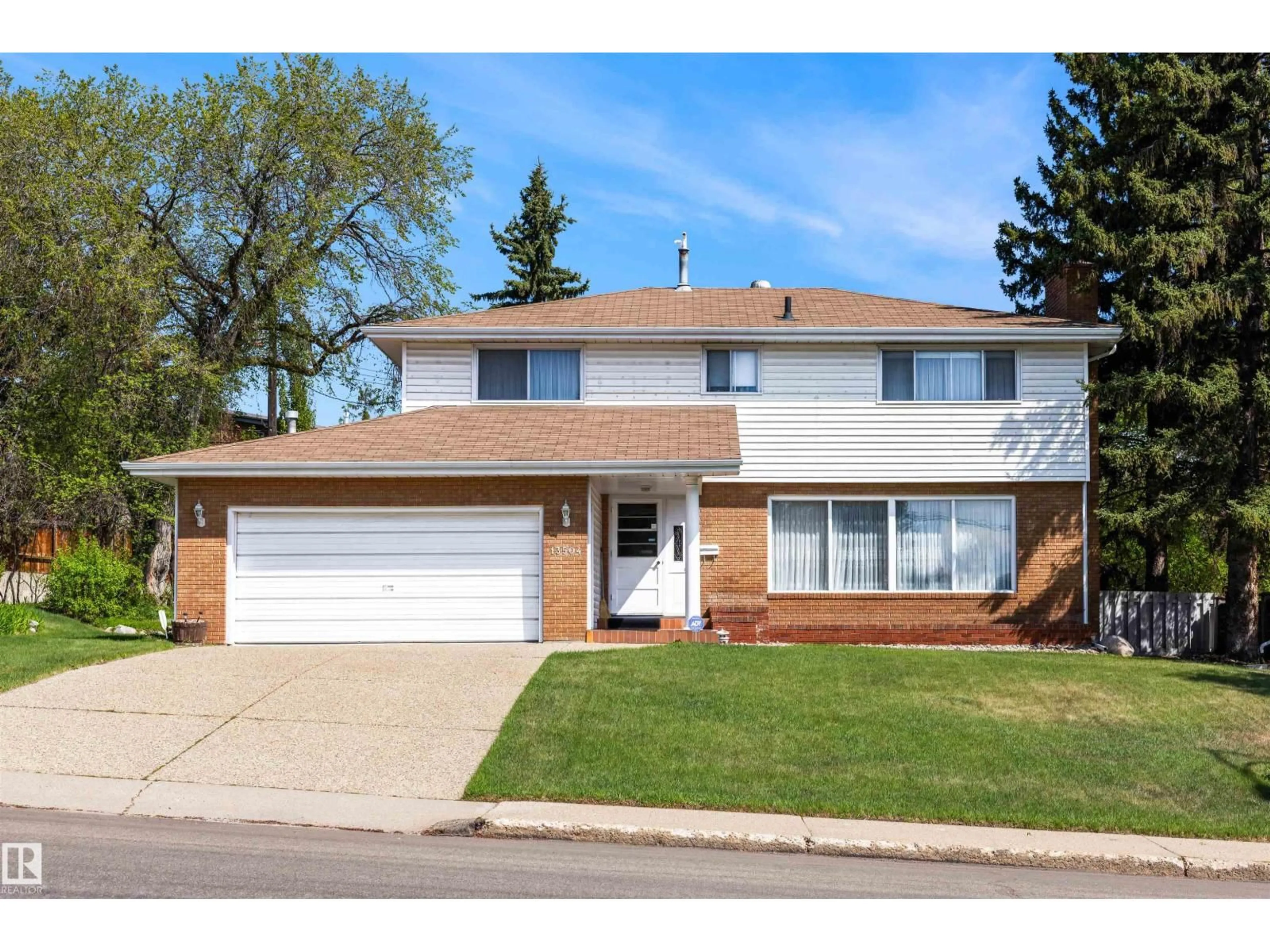 Home with vinyl exterior material, street for 13504 81 AV, Edmonton Alberta T5R3N5