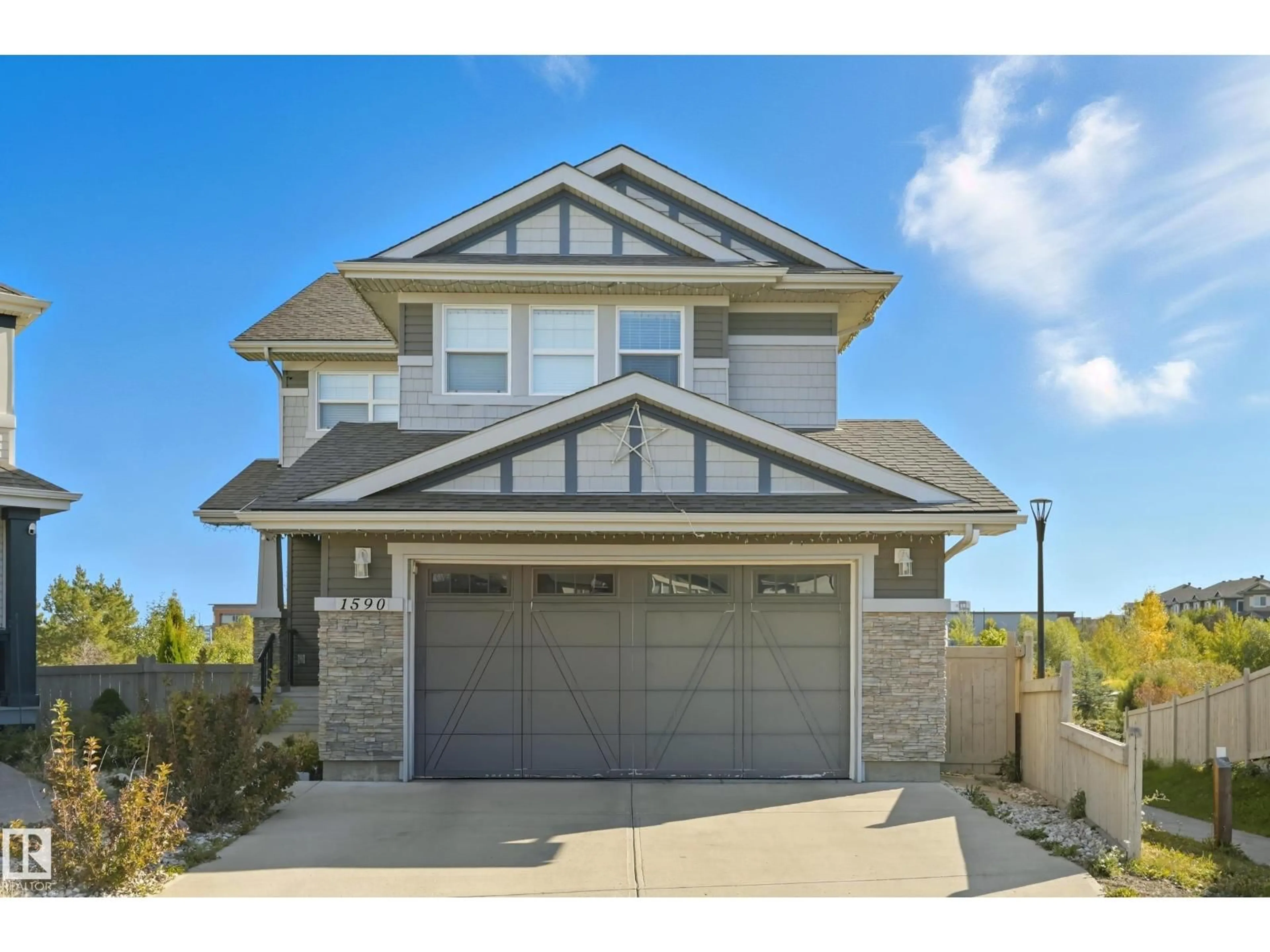 Home with brick exterior material, street for 1590 CHAPMAN WY, Edmonton Alberta T6W0Z2