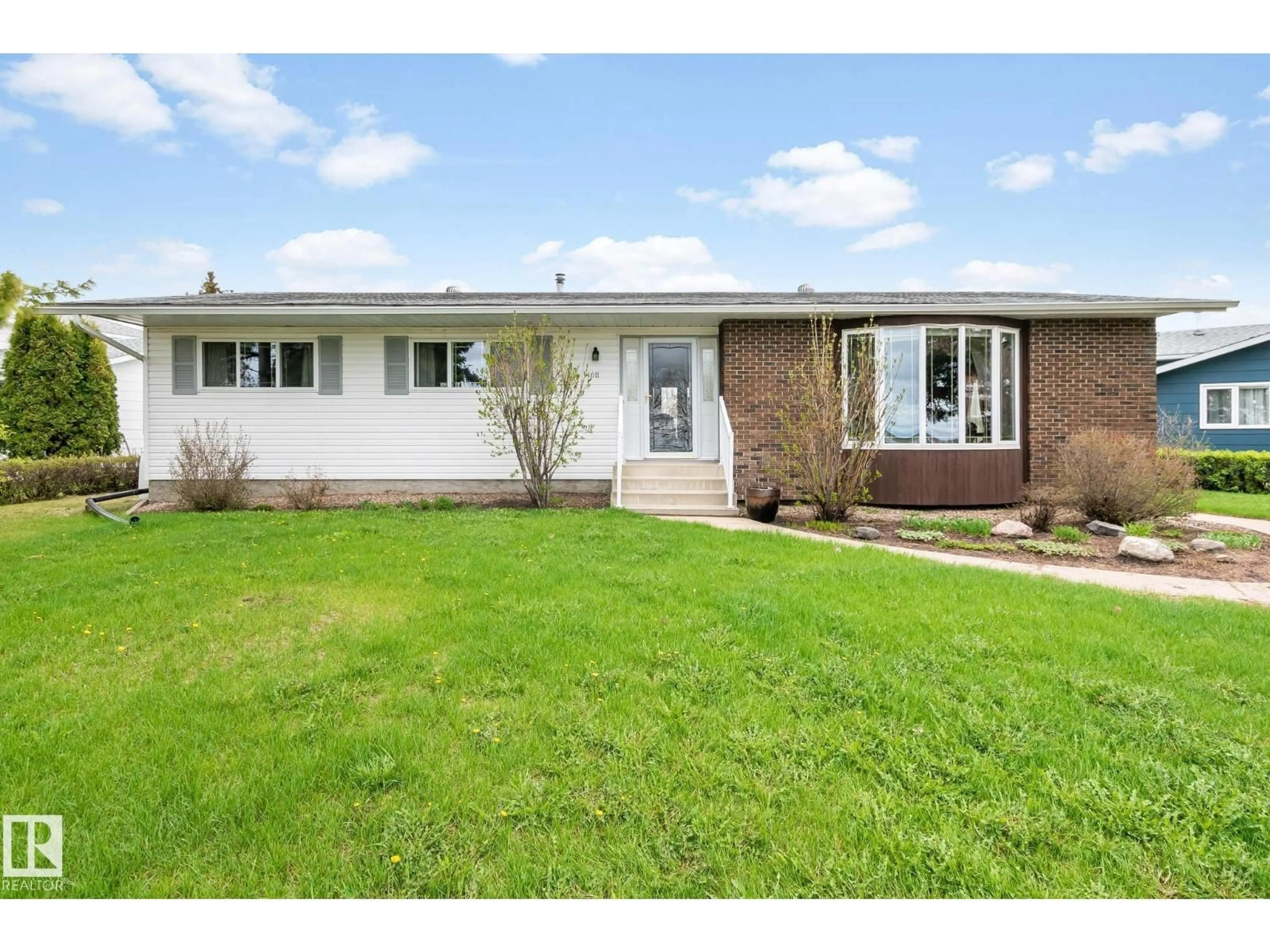 Home with vinyl exterior material, street for 4611 LAKESHORE DR, Bonnyville Town Alberta T9N1P9