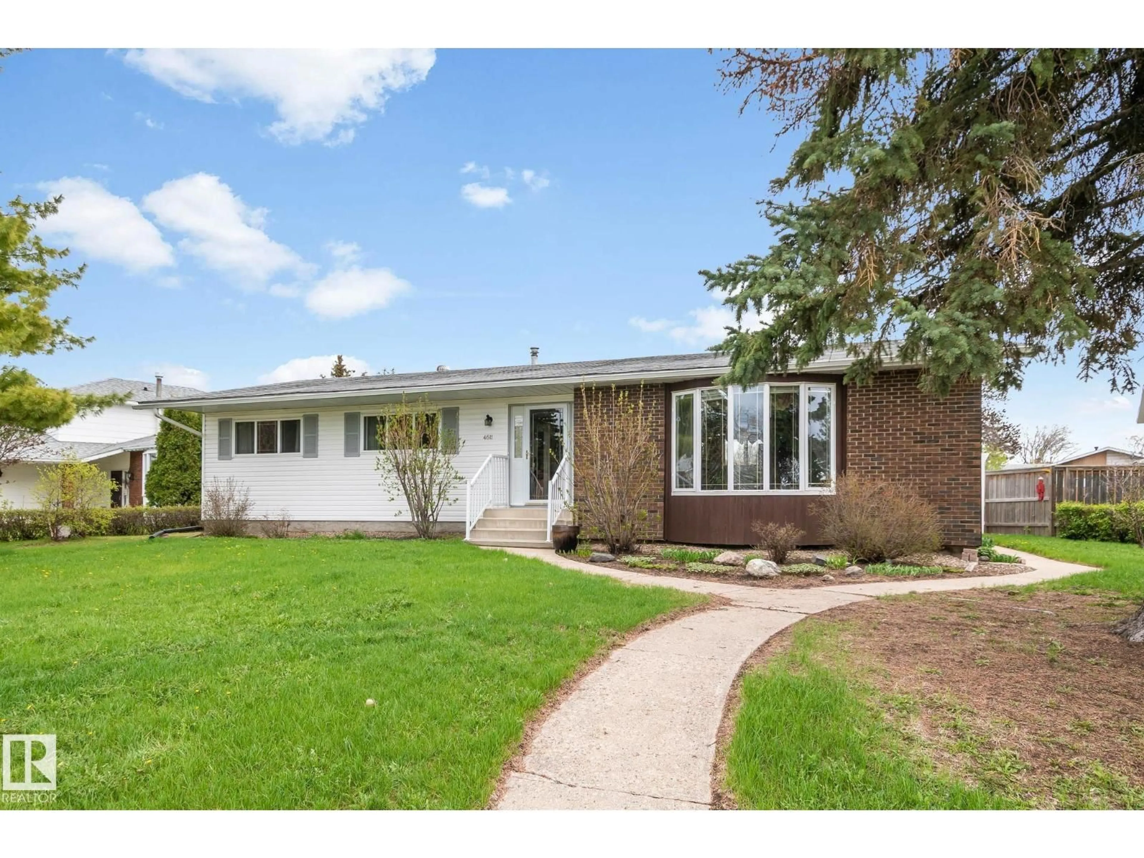 Home with brick exterior material, street for 4611 LAKESHORE DR, Bonnyville Town Alberta T9N1P9
