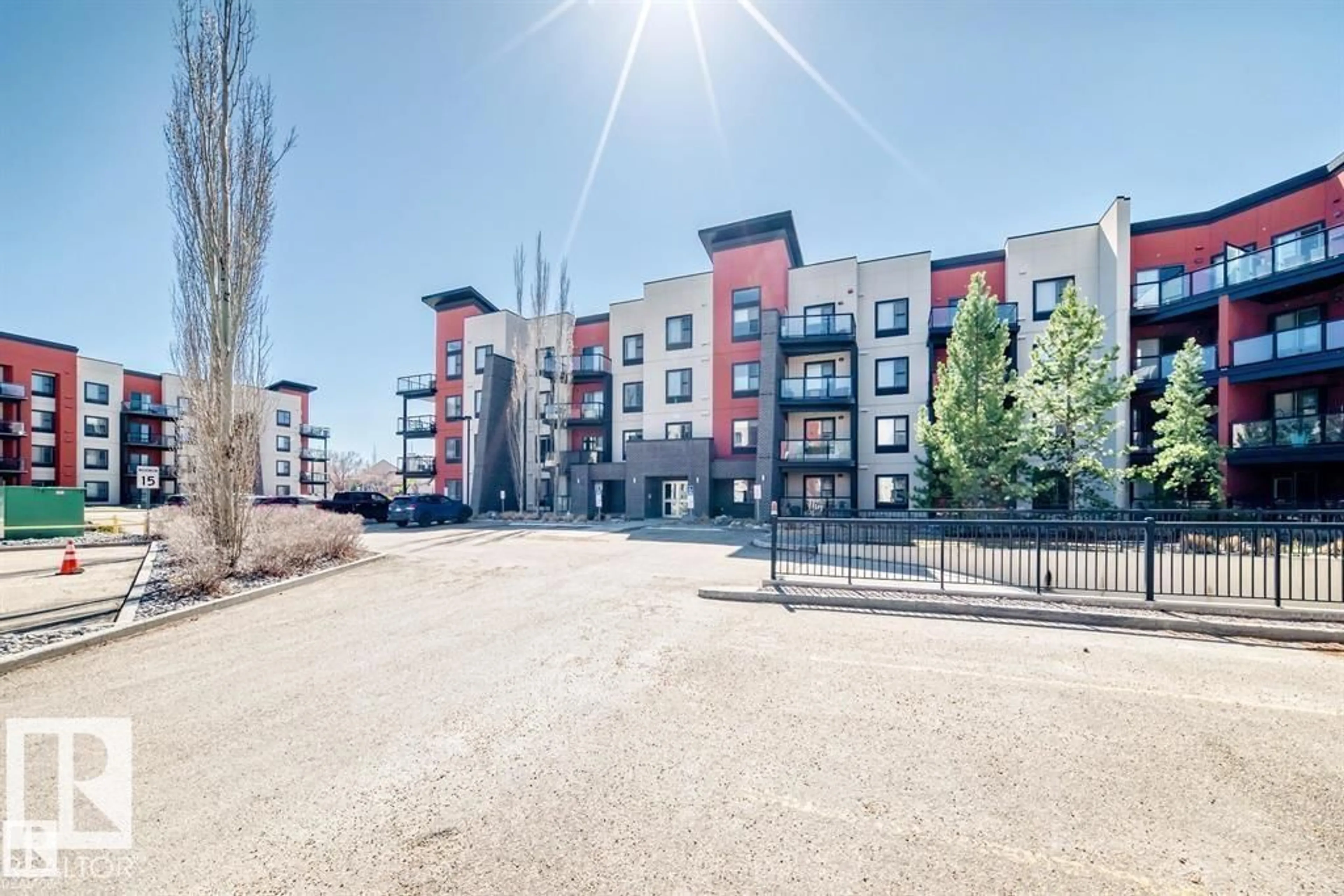 A pic from outside/outdoor area/front of a property/back of a property/a pic from drone, unknown for 308 - 228 AMBLESIDE LI, Edmonton Alberta T6W0V3