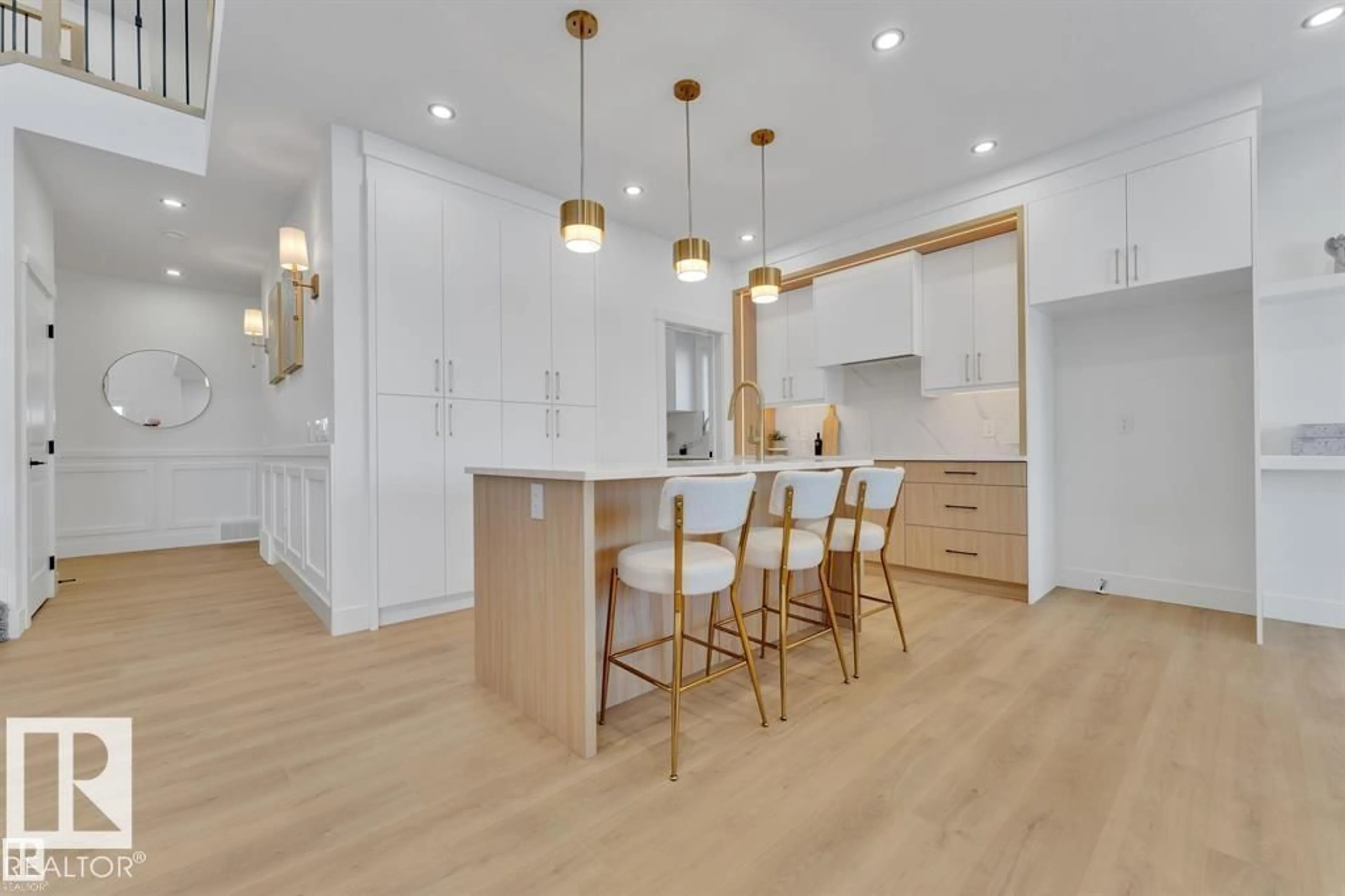 Open concept kitchen, wood/laminate floor for 1129 STARLING DR, Edmonton Alberta T5S0V4