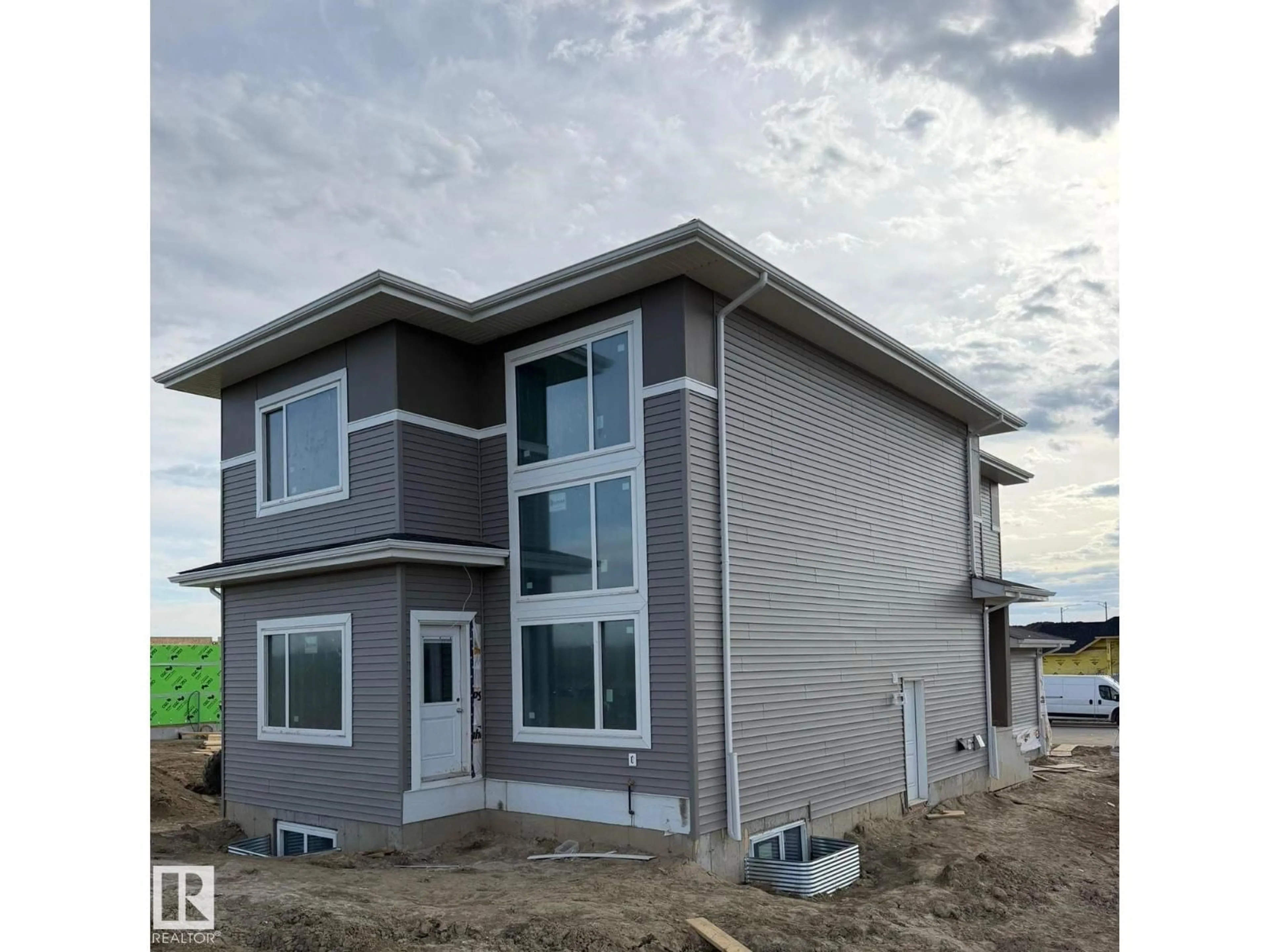 Home with vinyl exterior material, building for 1129 STARLING DR, Edmonton Alberta T5S0V4