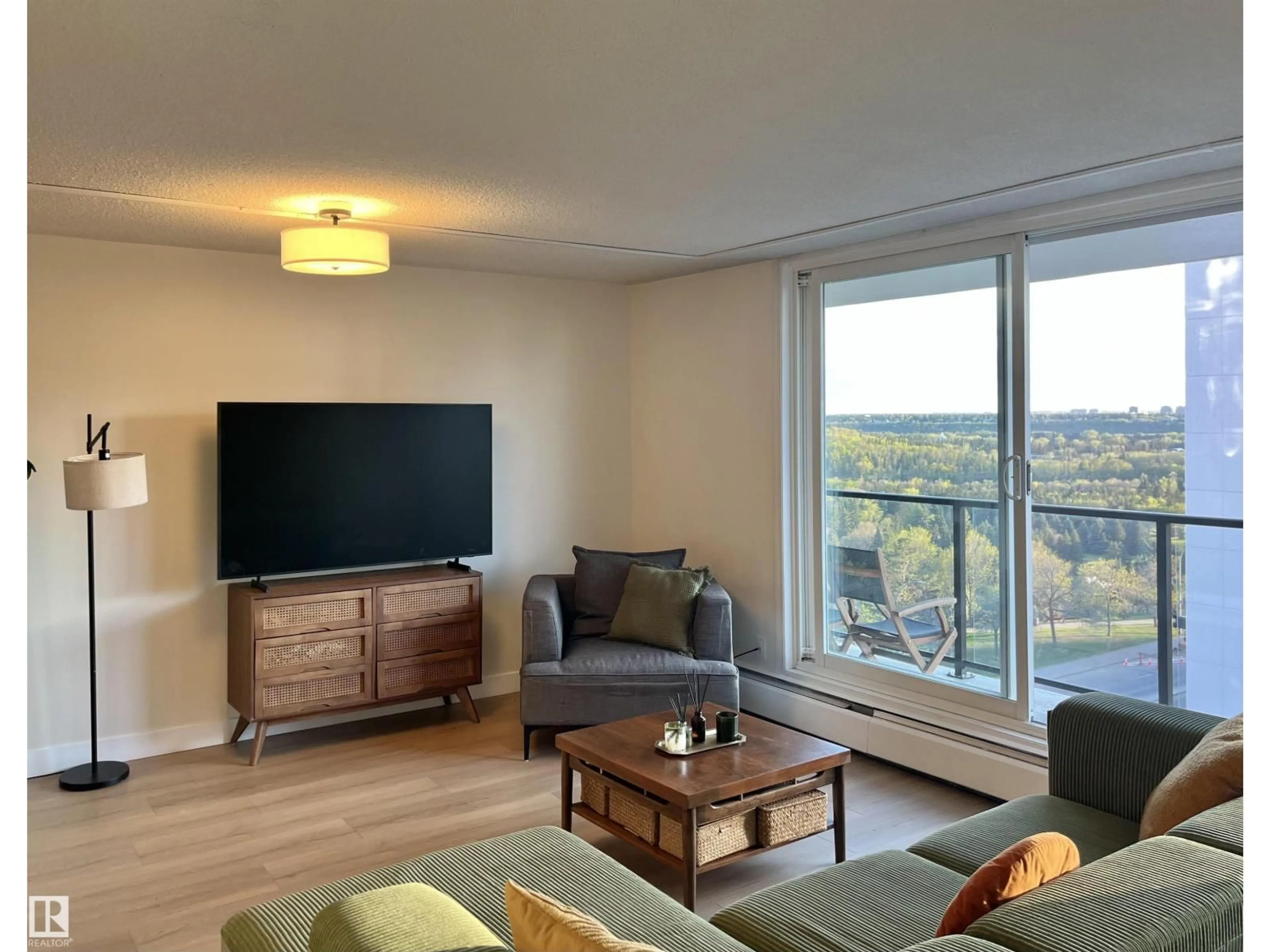 Living room with furniture, wood/laminate floor for #807 - 10011 116 ST, Edmonton Alberta T5K1V4