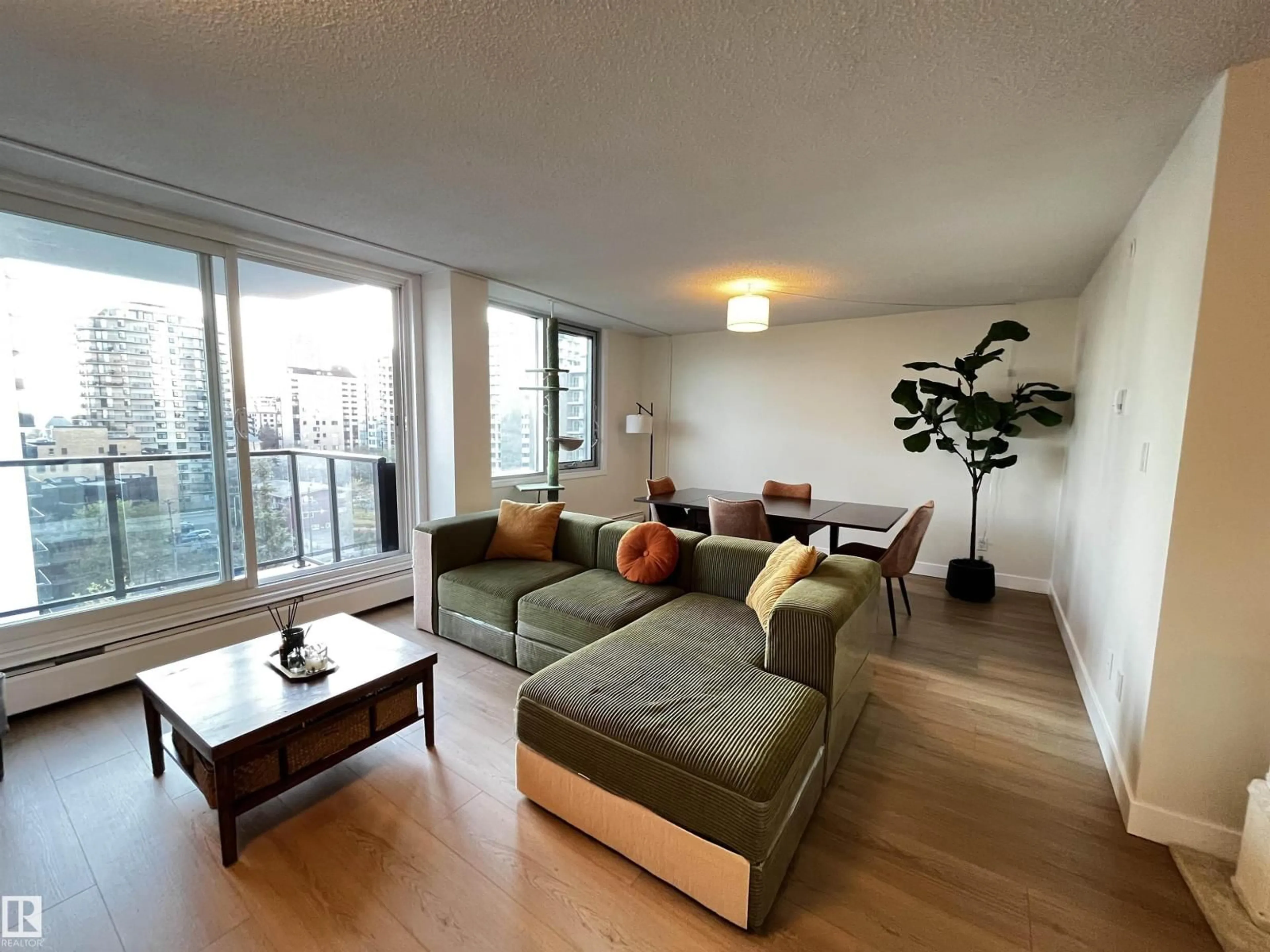 Living room with furniture, wood/laminate floor for #807 - 10011 116 ST, Edmonton Alberta T5K1V4