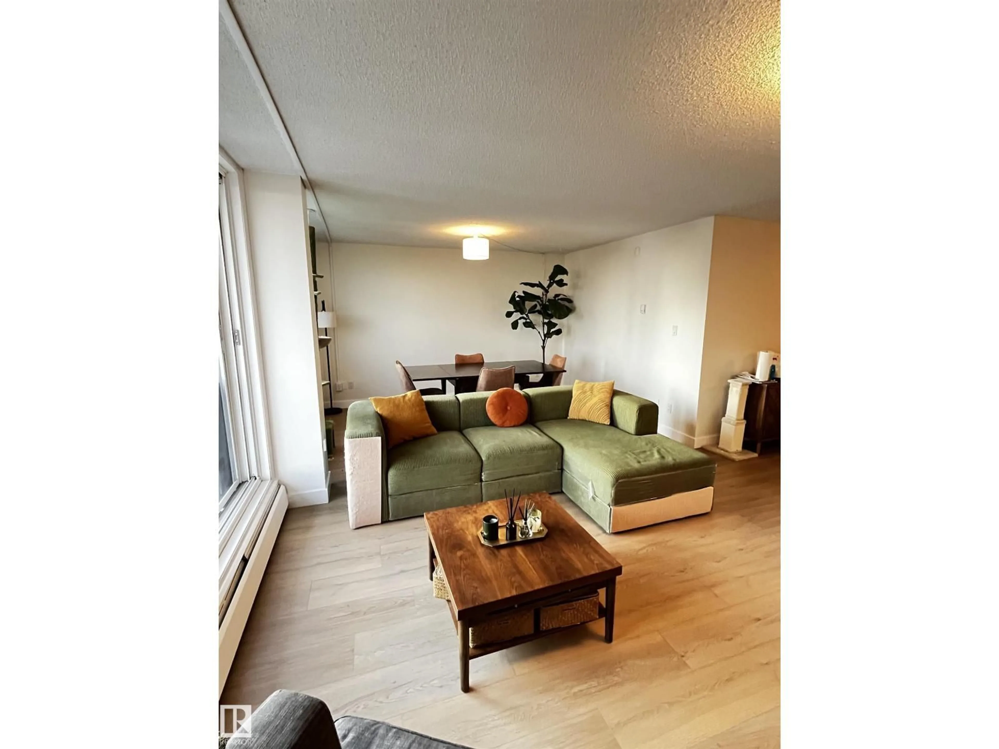 Living room with furniture, wood/laminate floor for #807 - 10011 116 ST, Edmonton Alberta T5K1V4