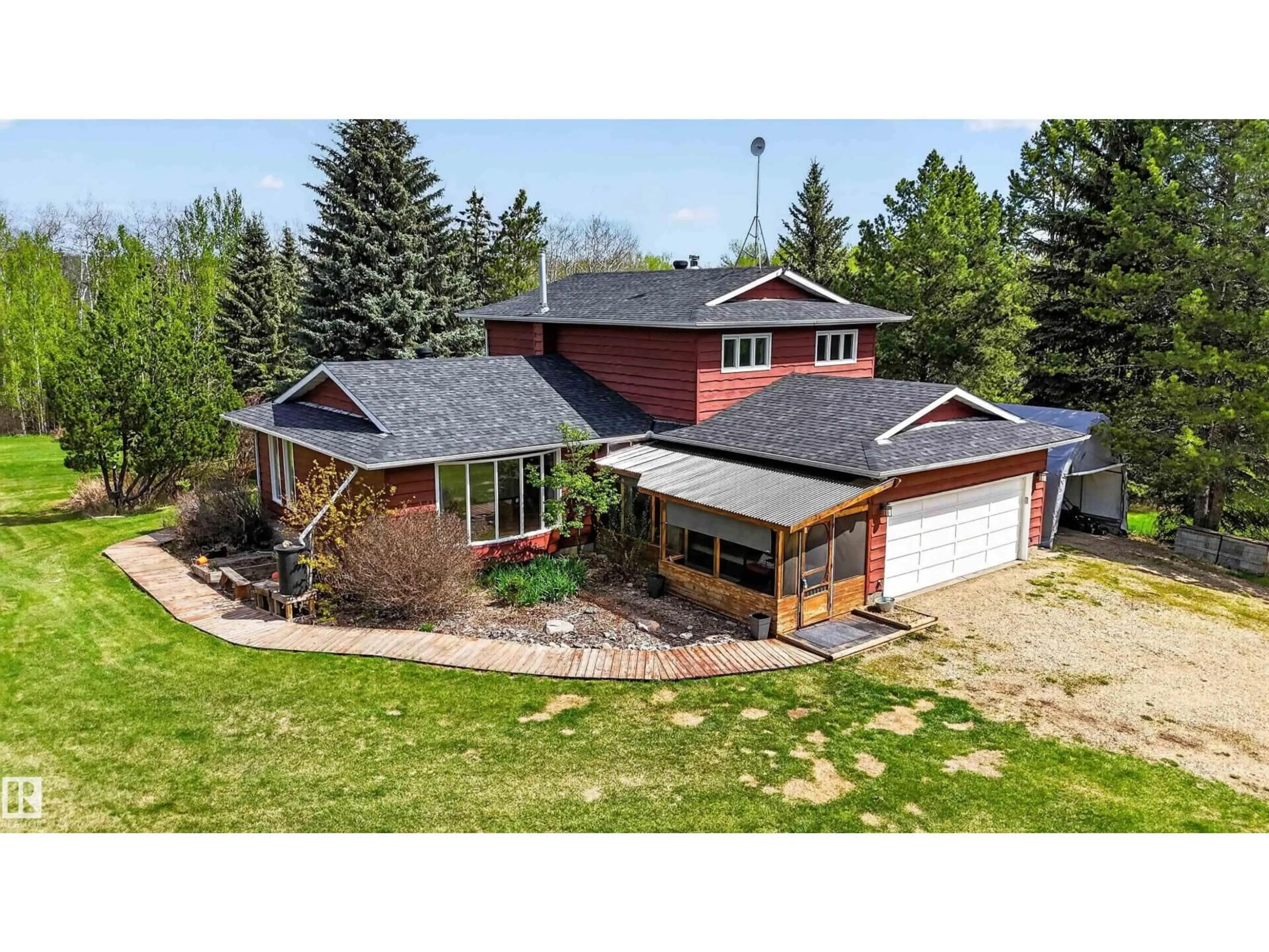 A pic from outside/outdoor area/front of a property/back of a property/a pic from drone, building for #6 - 53218 RGE ROAD 14, Rural Parkland County Alberta T7Y0G3