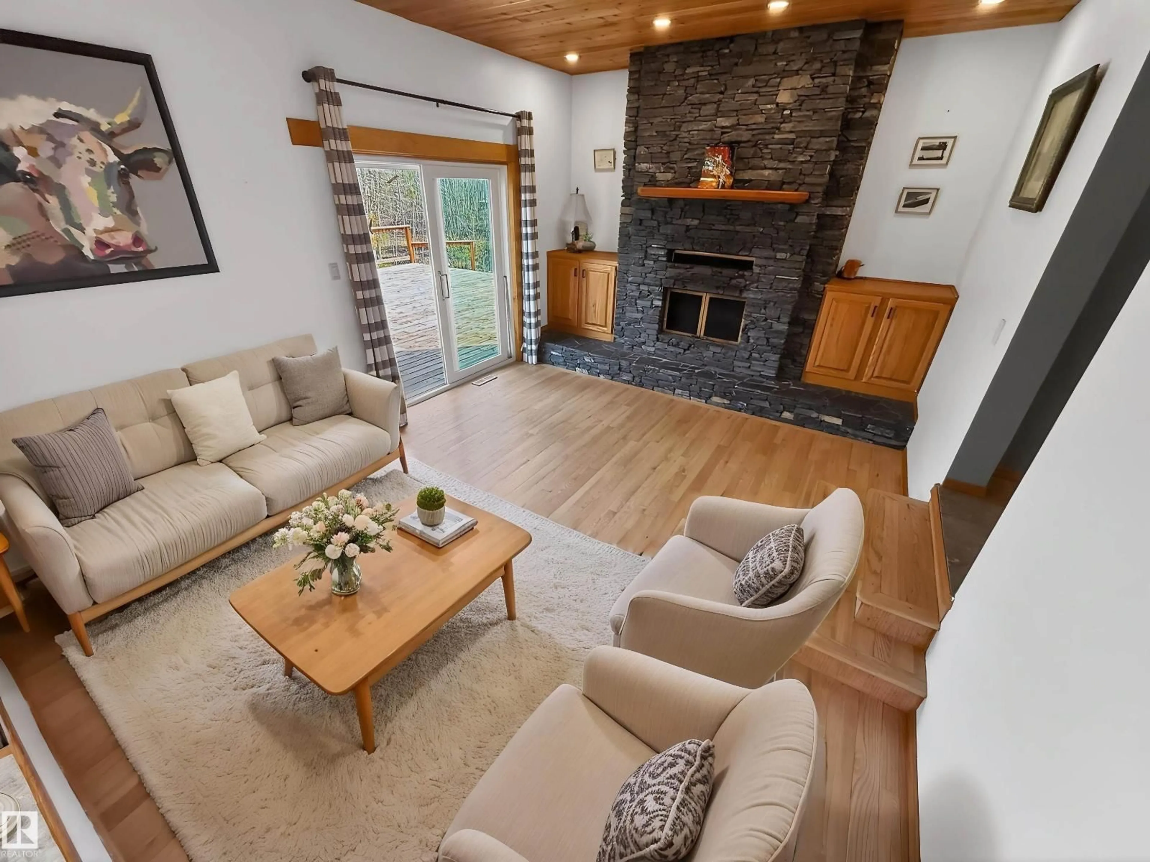 Living room with furniture, wood/laminate floor for #6 - 53218 RGE ROAD 14, Rural Parkland County Alberta T7Y0G3