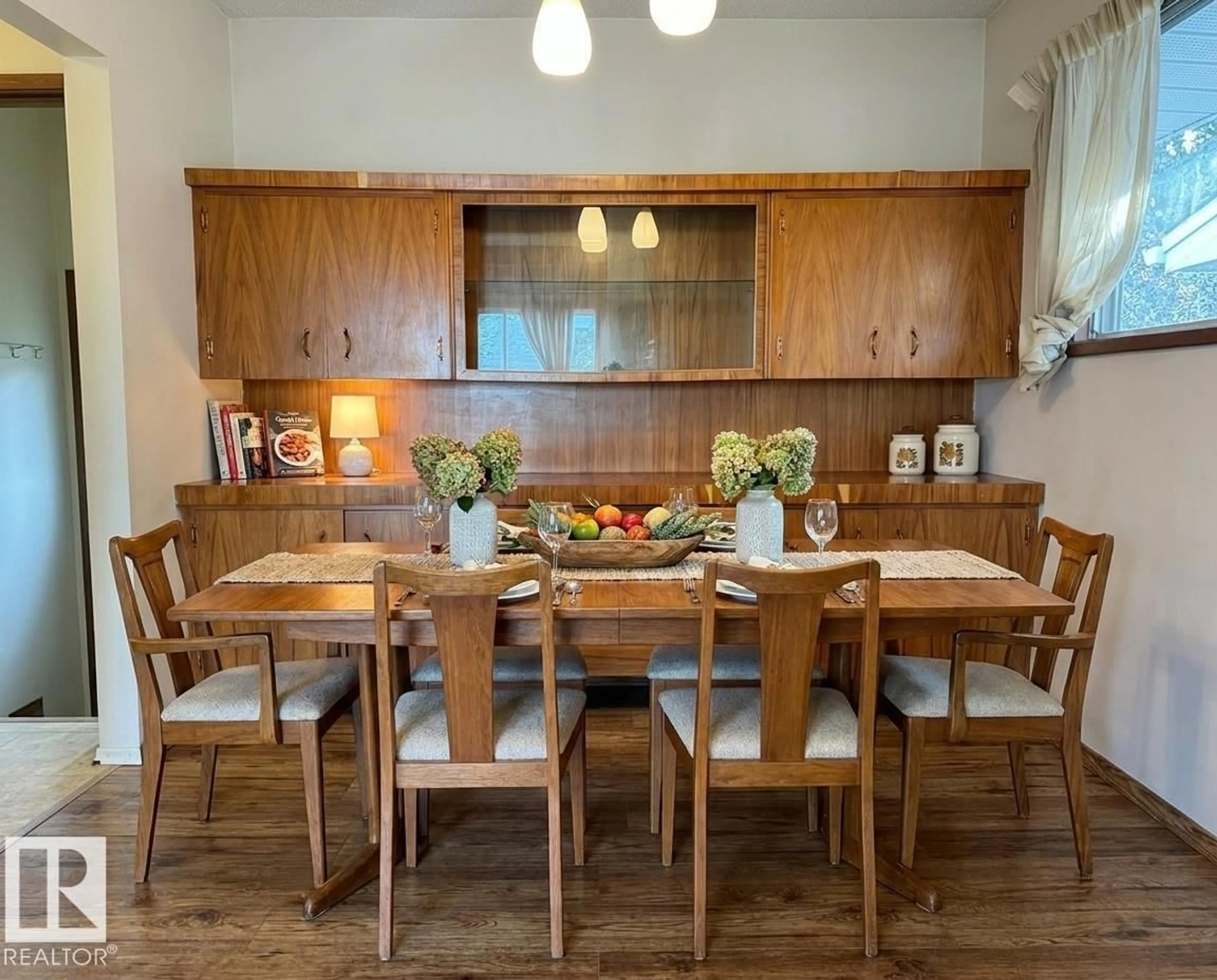 Dining room, wood/laminate floor for 5707 90 AV, Edmonton Alberta T6B0P1