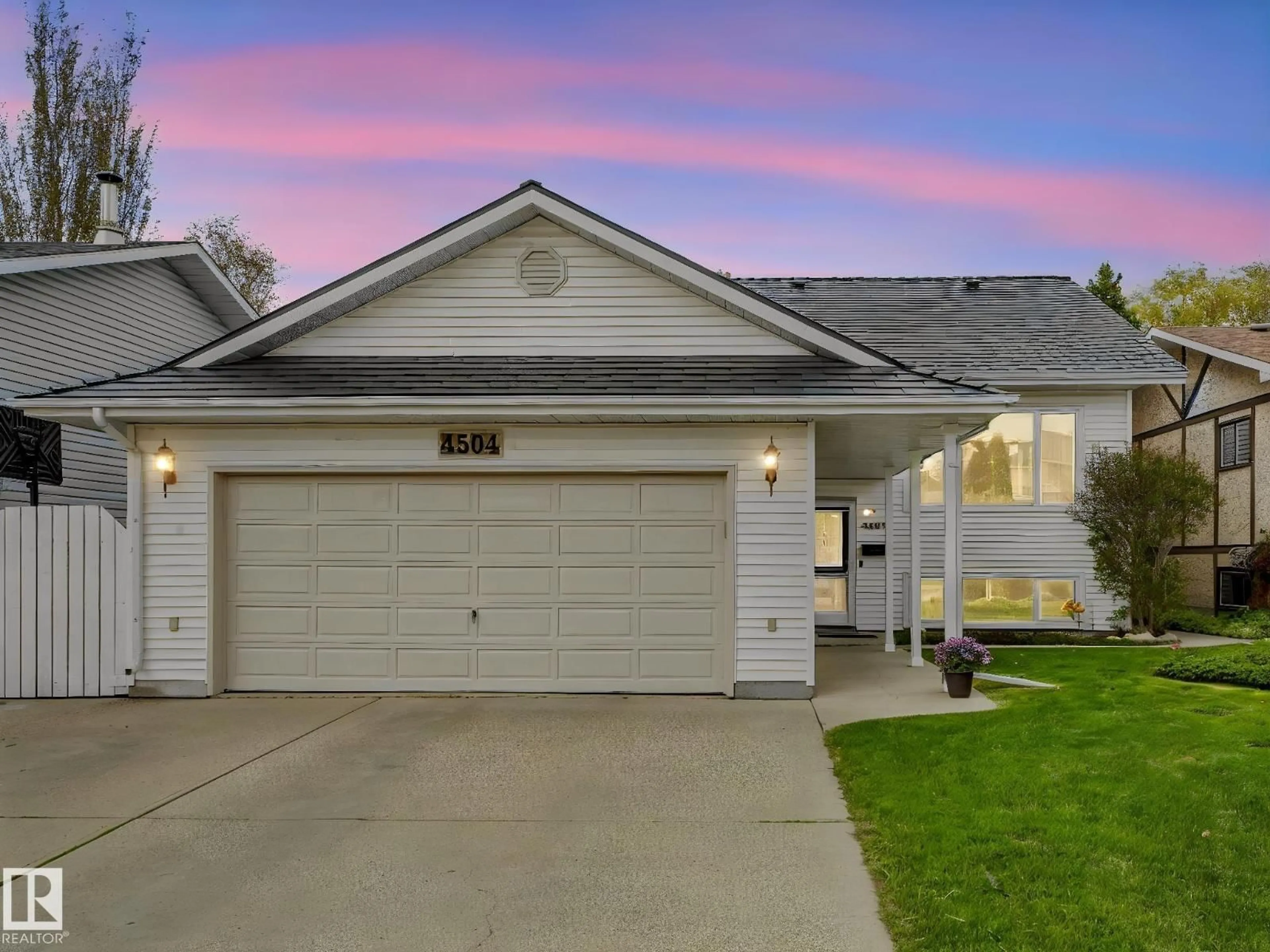 Home with vinyl exterior material, street for 4504 29 AV, Edmonton Alberta T6L4S4