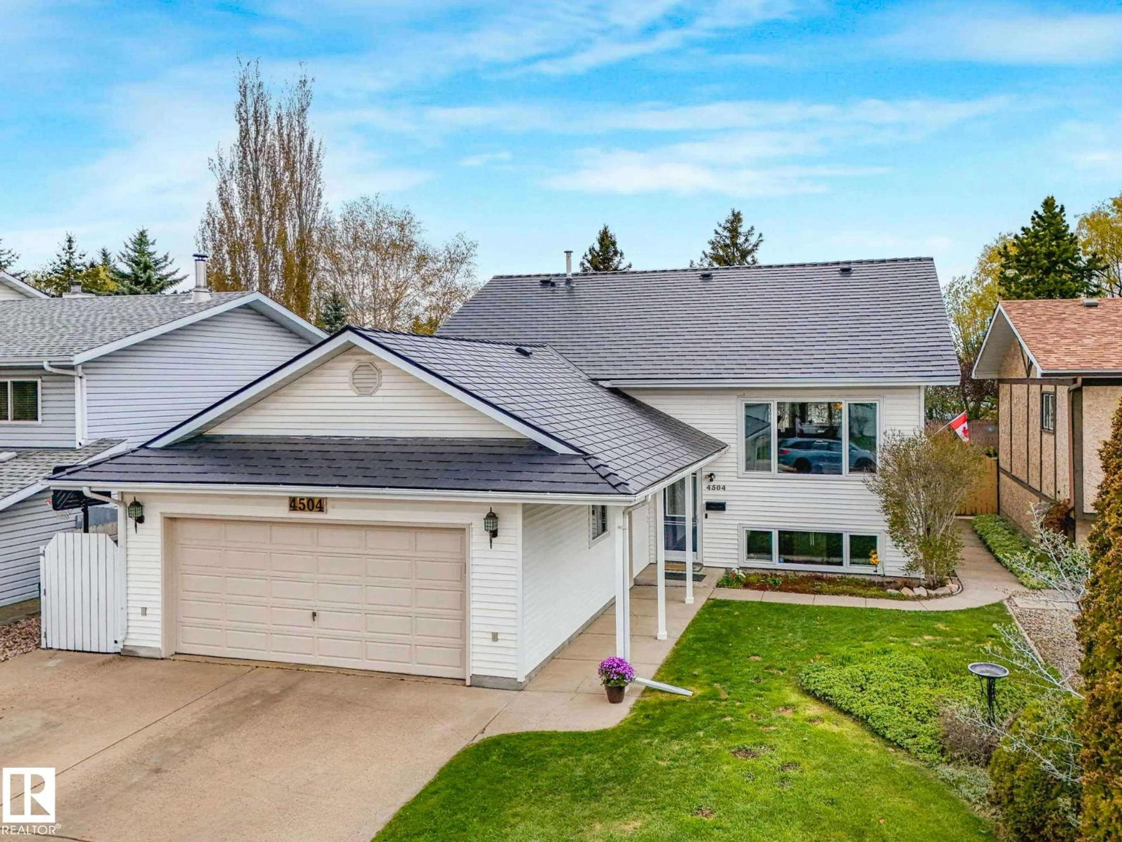 Home with vinyl exterior material, street for 4504 29 AV, Edmonton Alberta T6L4S4