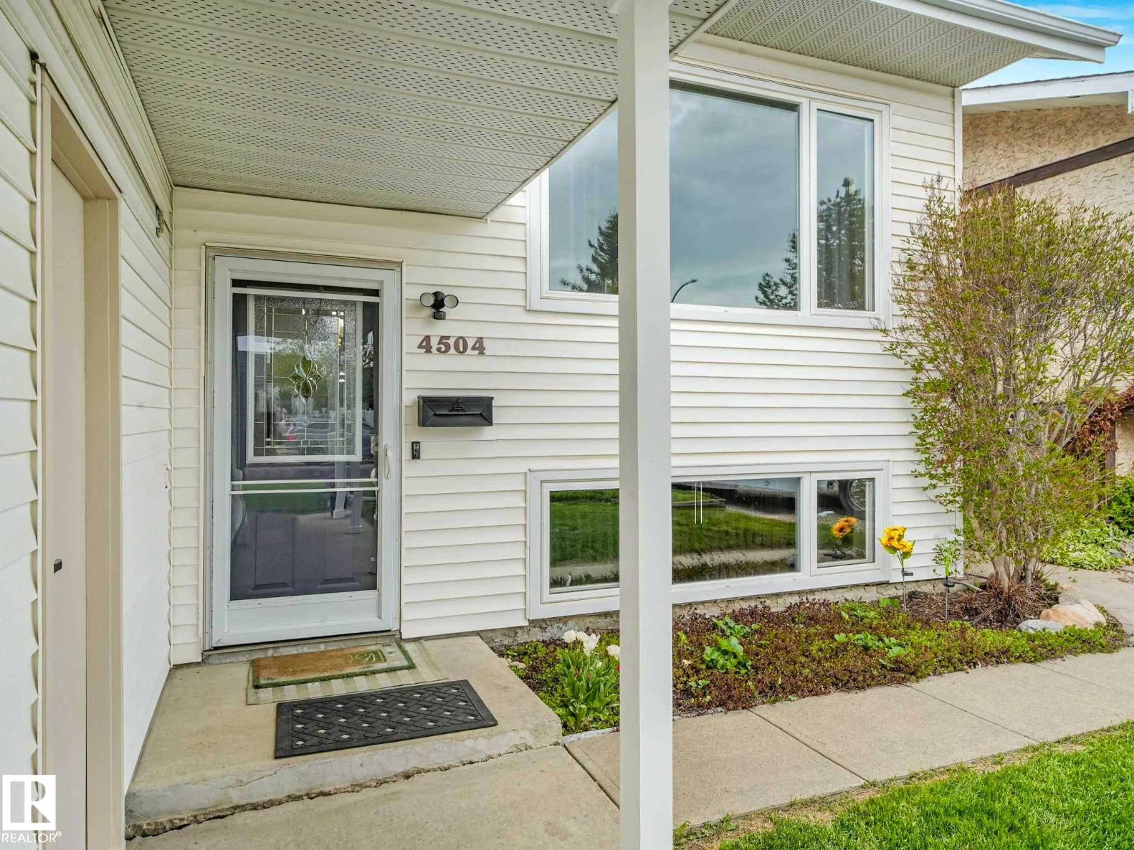 Home with vinyl exterior material, street for 4504 29 AV, Edmonton Alberta T6L4S4