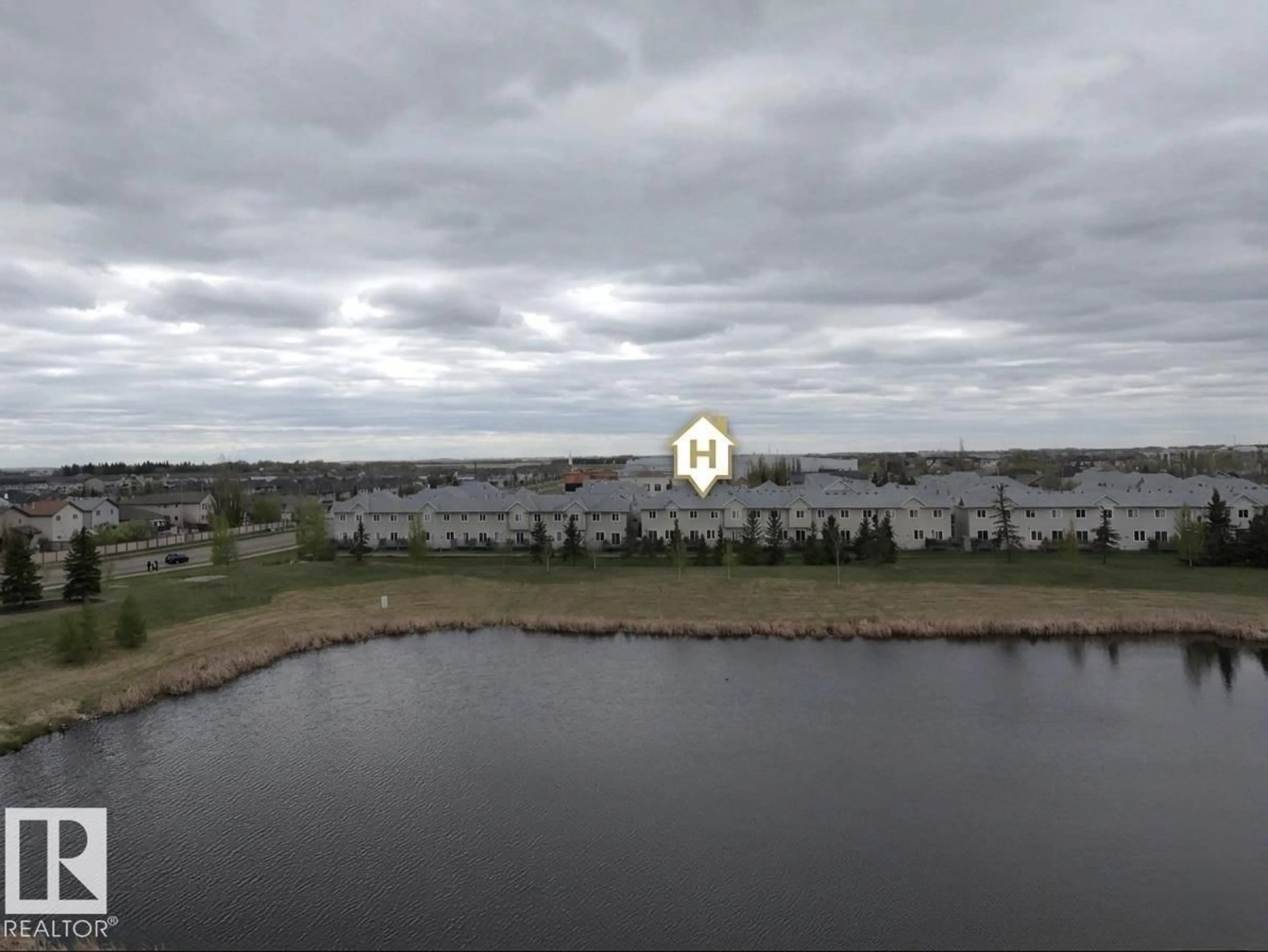 A pic from outside/outdoor area/front of a property/back of a property/a pic from drone, water/lake/river/ocean view for 82 5001 62 ST, Beaumont Alberta T4X0C7