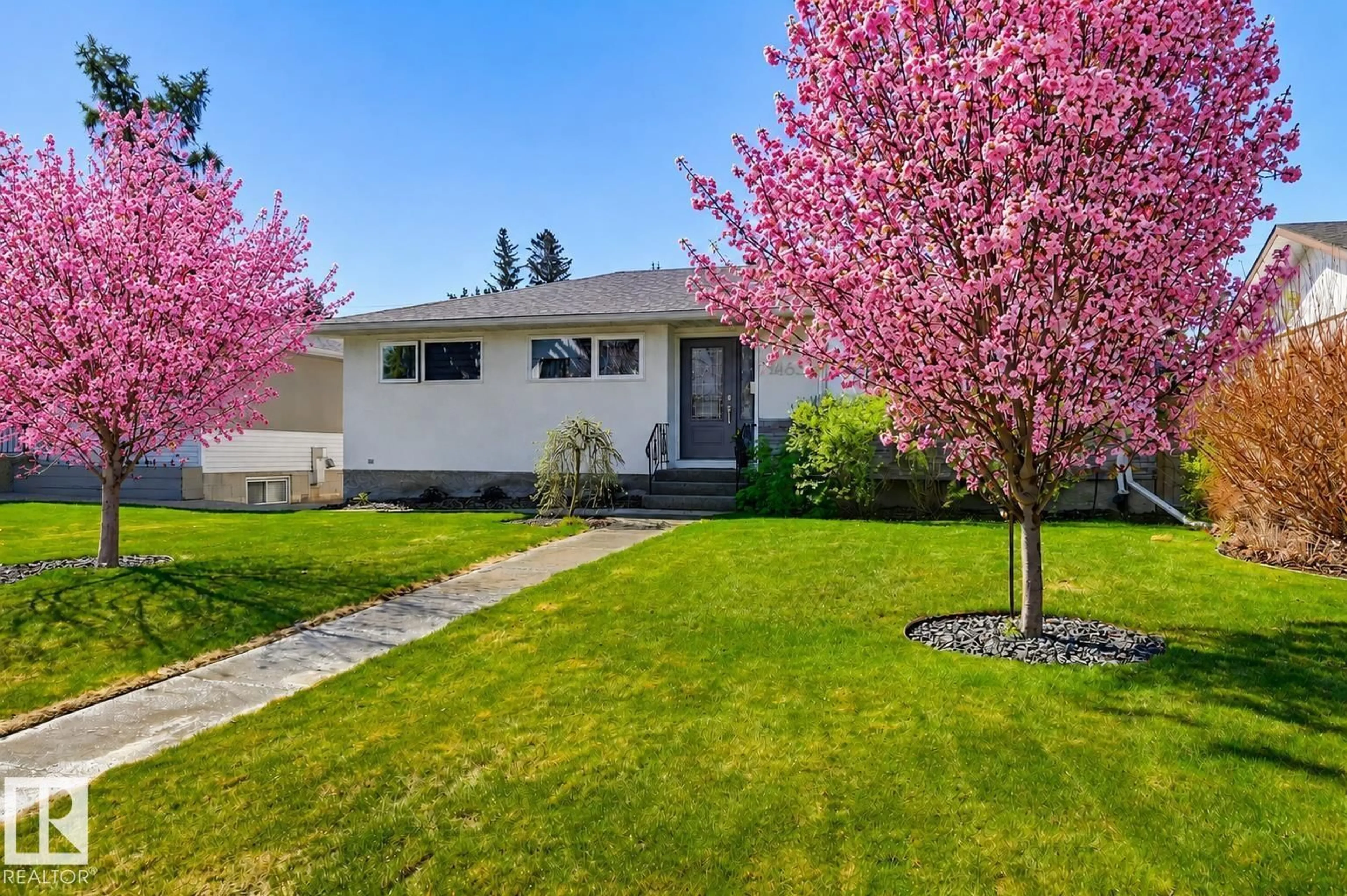 Home with vinyl exterior material, street for 14631 88 AV, Edmonton Alberta T5R4J7