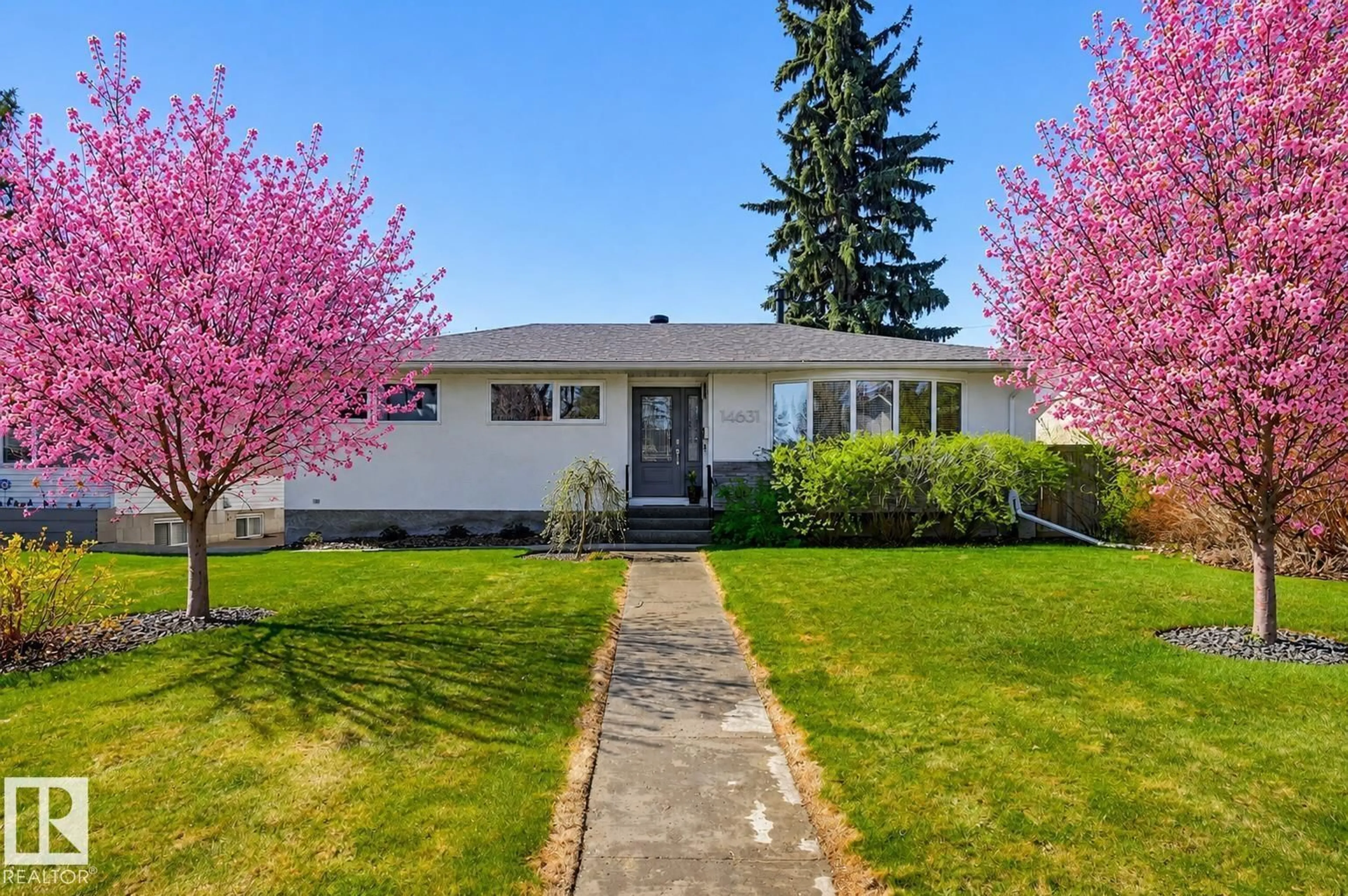 Home with vinyl exterior material, street for 14631 88 AV, Edmonton Alberta T5R4J7