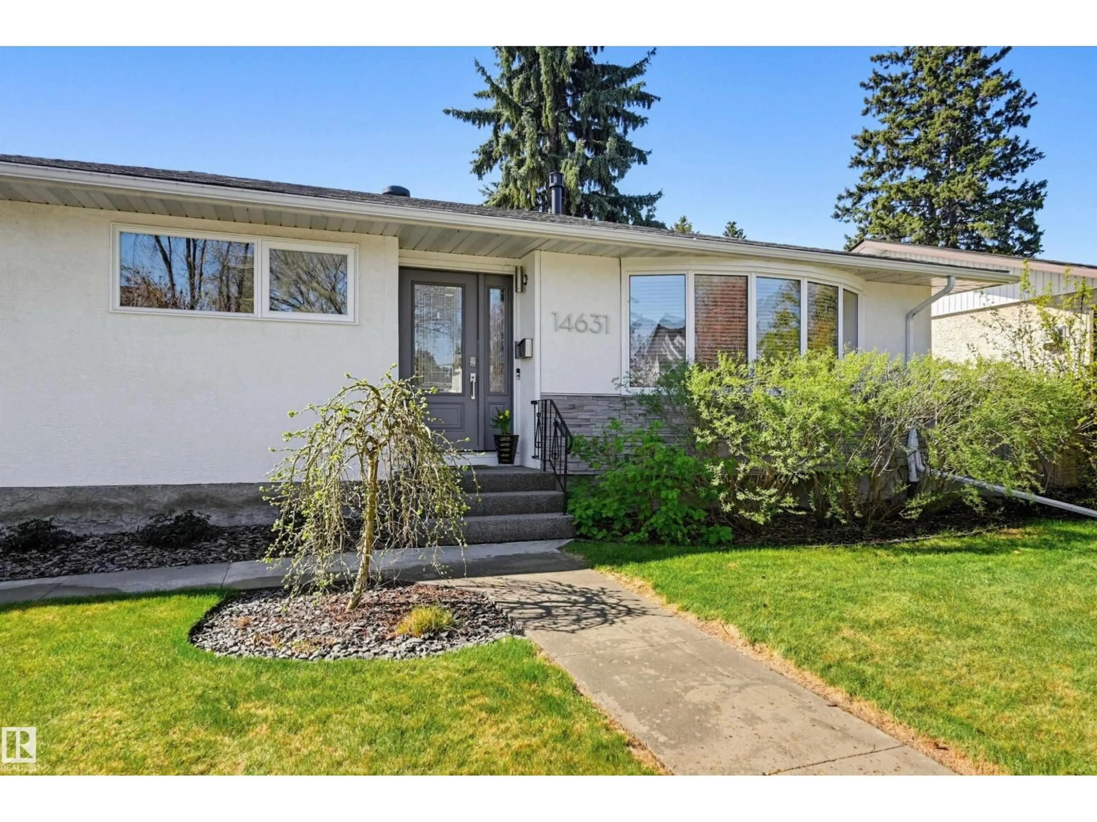 Home with vinyl exterior material, street for 14631 88 AV, Edmonton Alberta T5R4J7