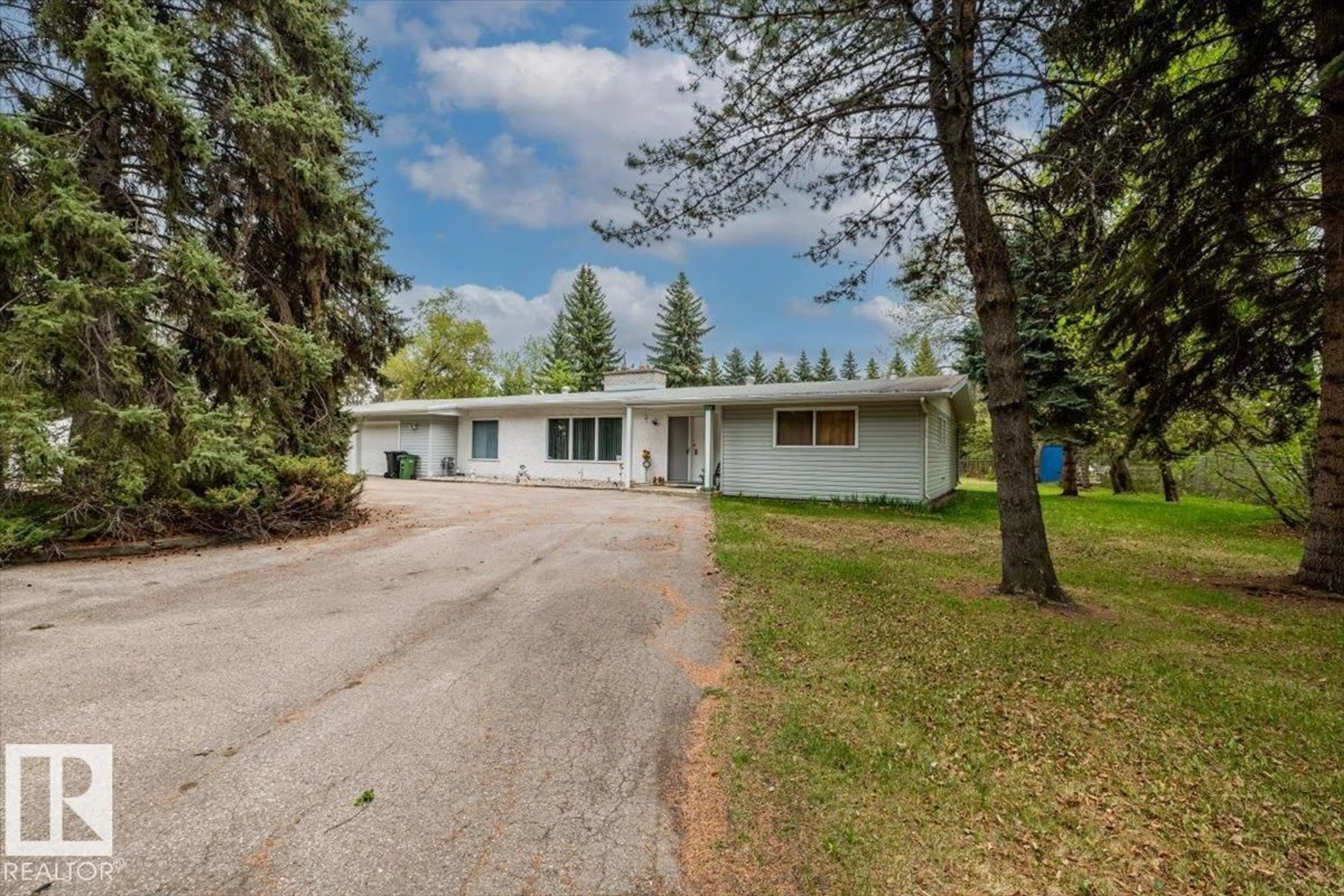 A pic from outside/outdoor area/front of a property/back of a property/a pic from drone, unknown for NW - 4411 209 ST, Edmonton Alberta T6M2P3