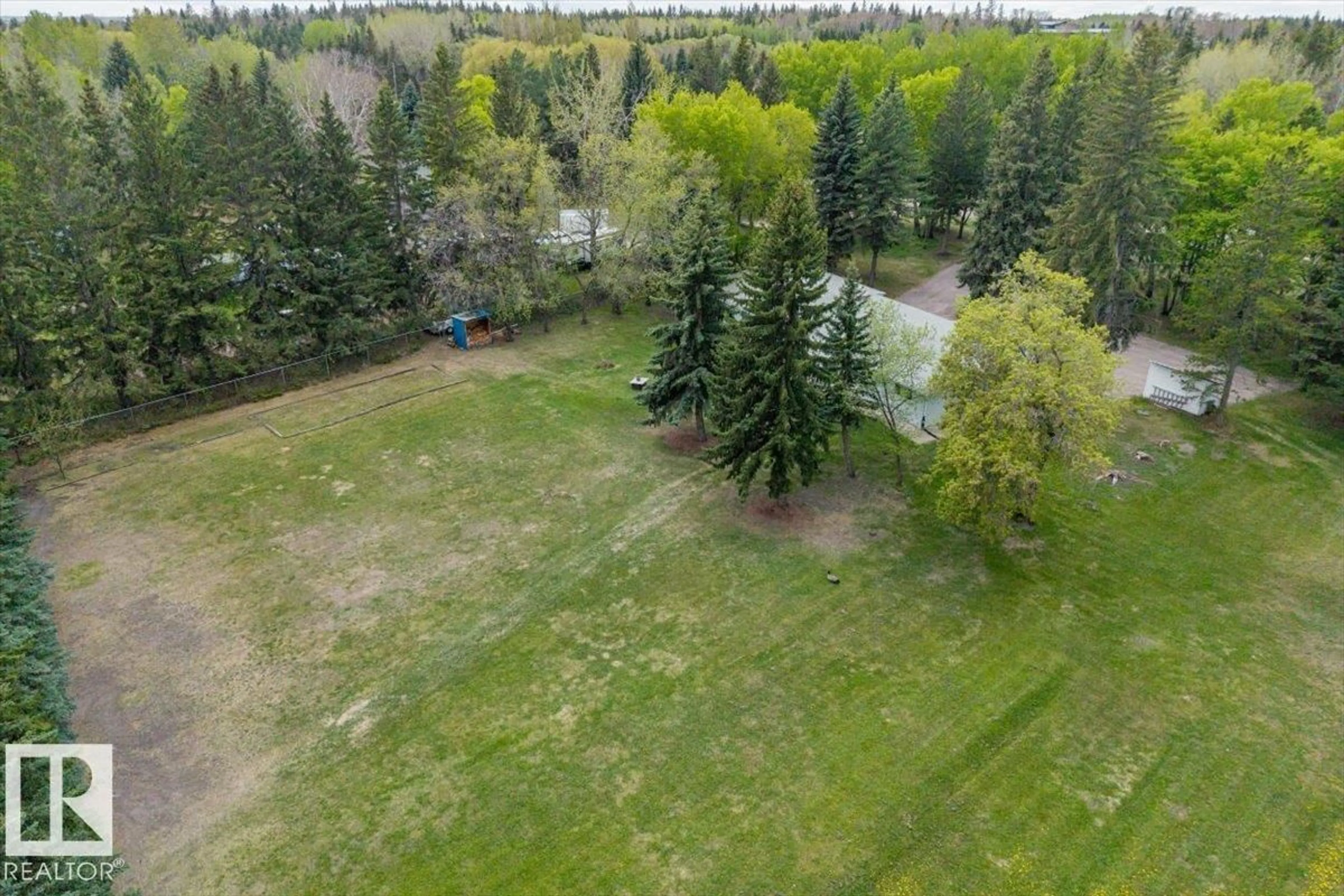 A pic from outside/outdoor area/front of a property/back of a property/a pic from drone, forest/trees view for NW - 4411 209 ST, Edmonton Alberta T6M2P3