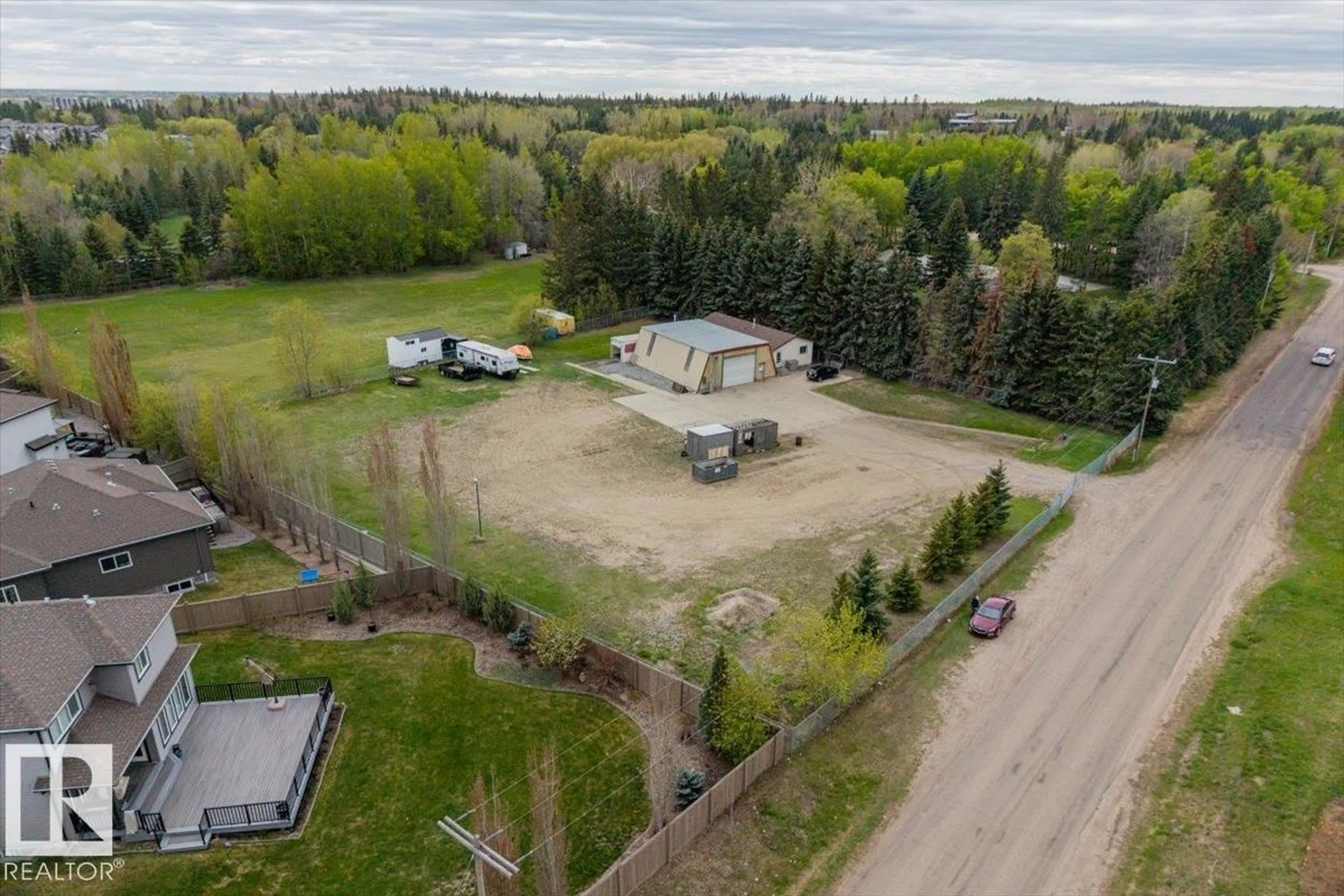A pic from outside/outdoor area/front of a property/back of a property/a pic from drone, unknown for NW - 4411 209 ST, Edmonton Alberta T6M2P3