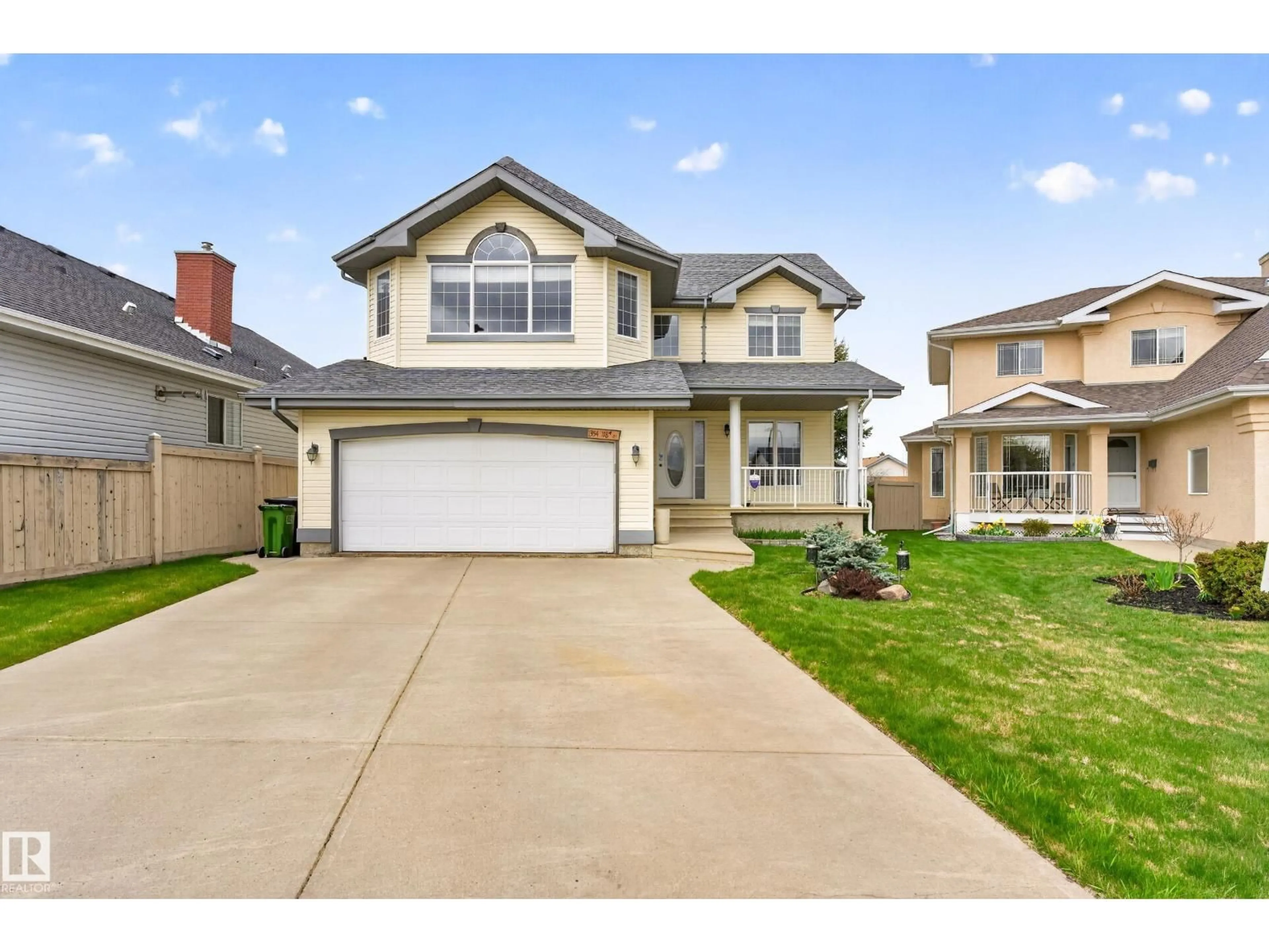 Home with vinyl exterior material, street for NW - 1354 118A ST, Edmonton Alberta T6J7G2