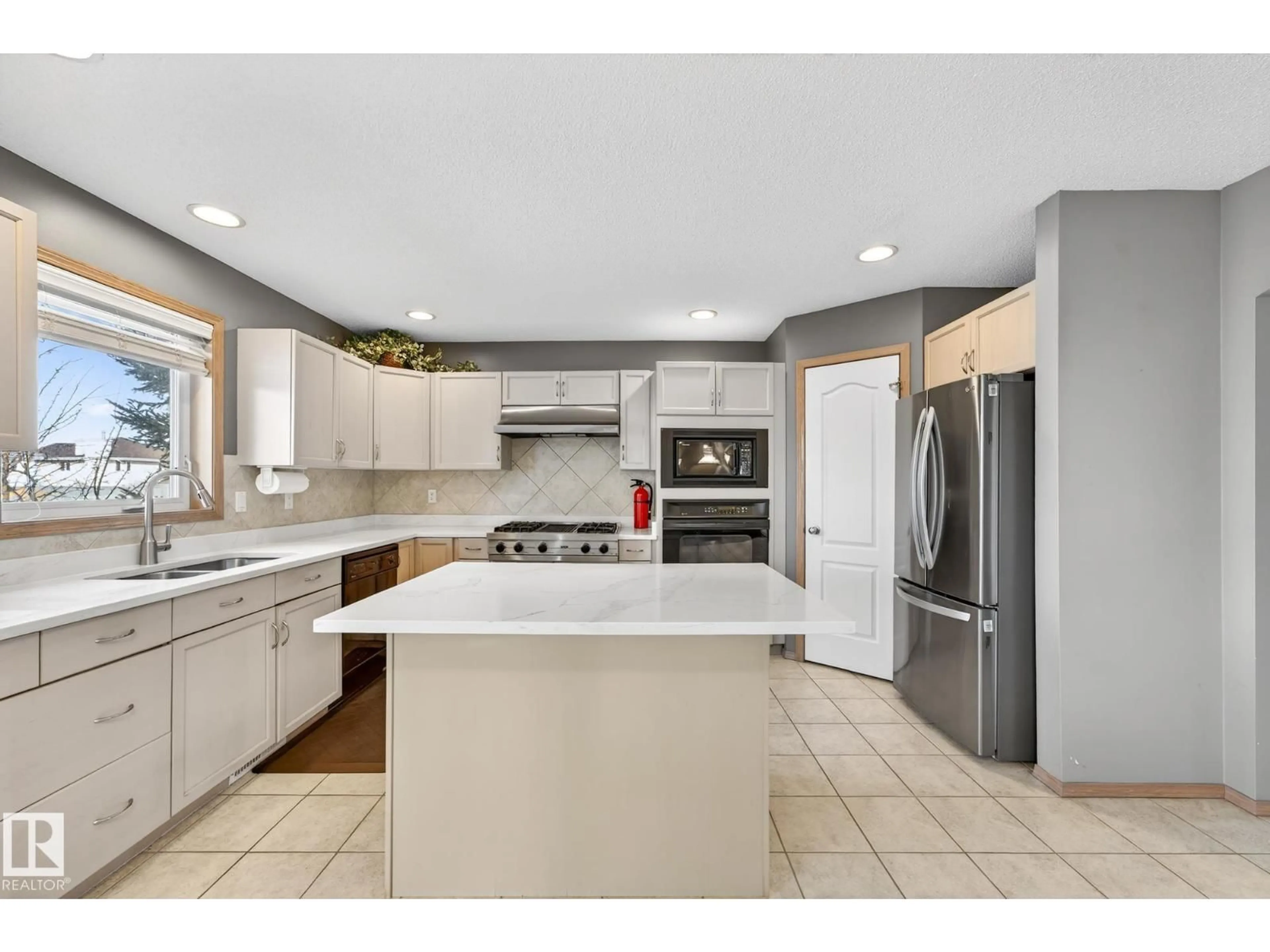 Open concept kitchen, ceramic/tile floor for NW - 1354 118A ST, Edmonton Alberta T6J7G2
