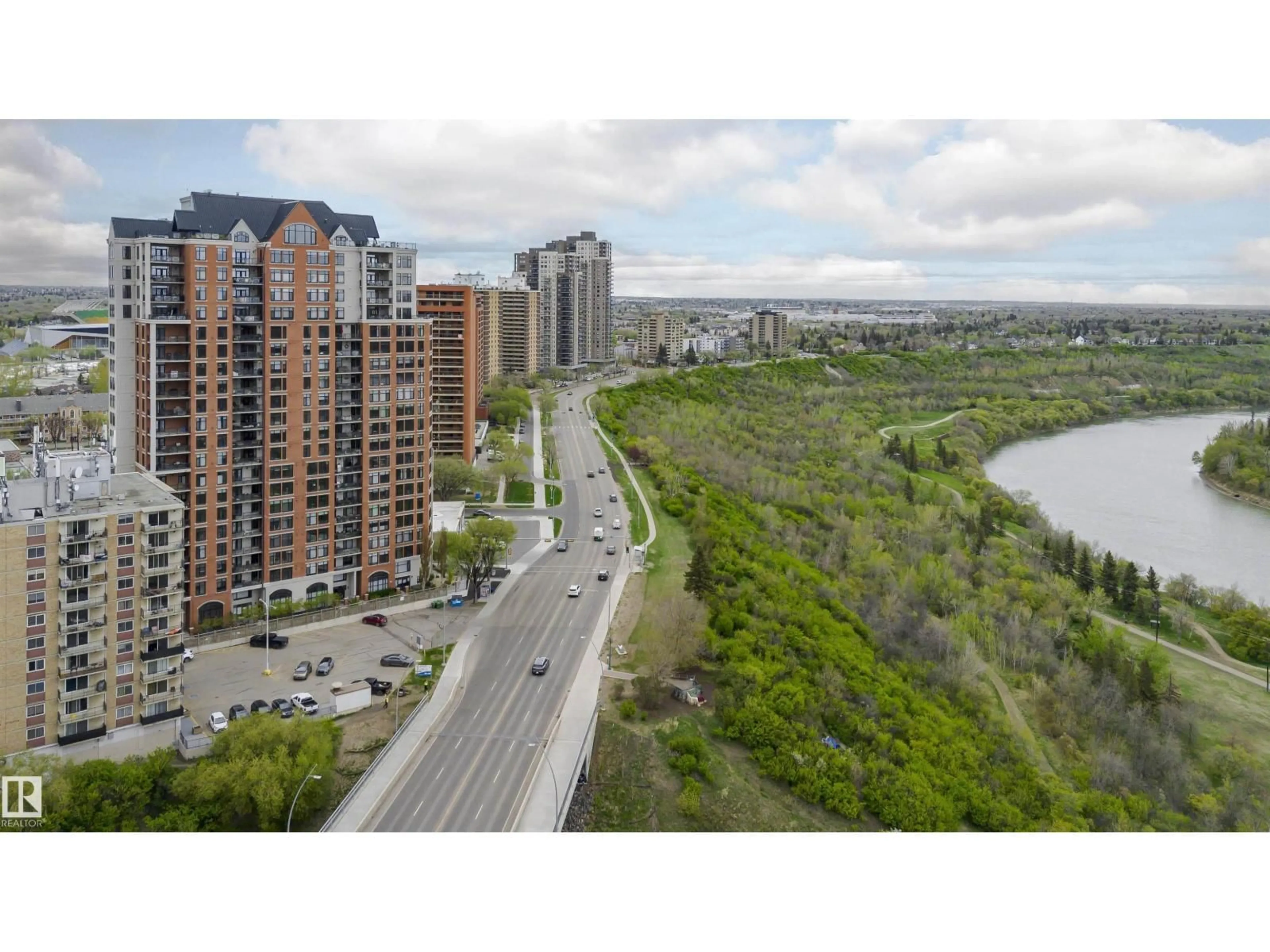 A pic from outside/outdoor area/front of a property/back of a property/a pic from drone, unknown for 2104 JASPER AV NW, Edmonton Alberta T5H3S9