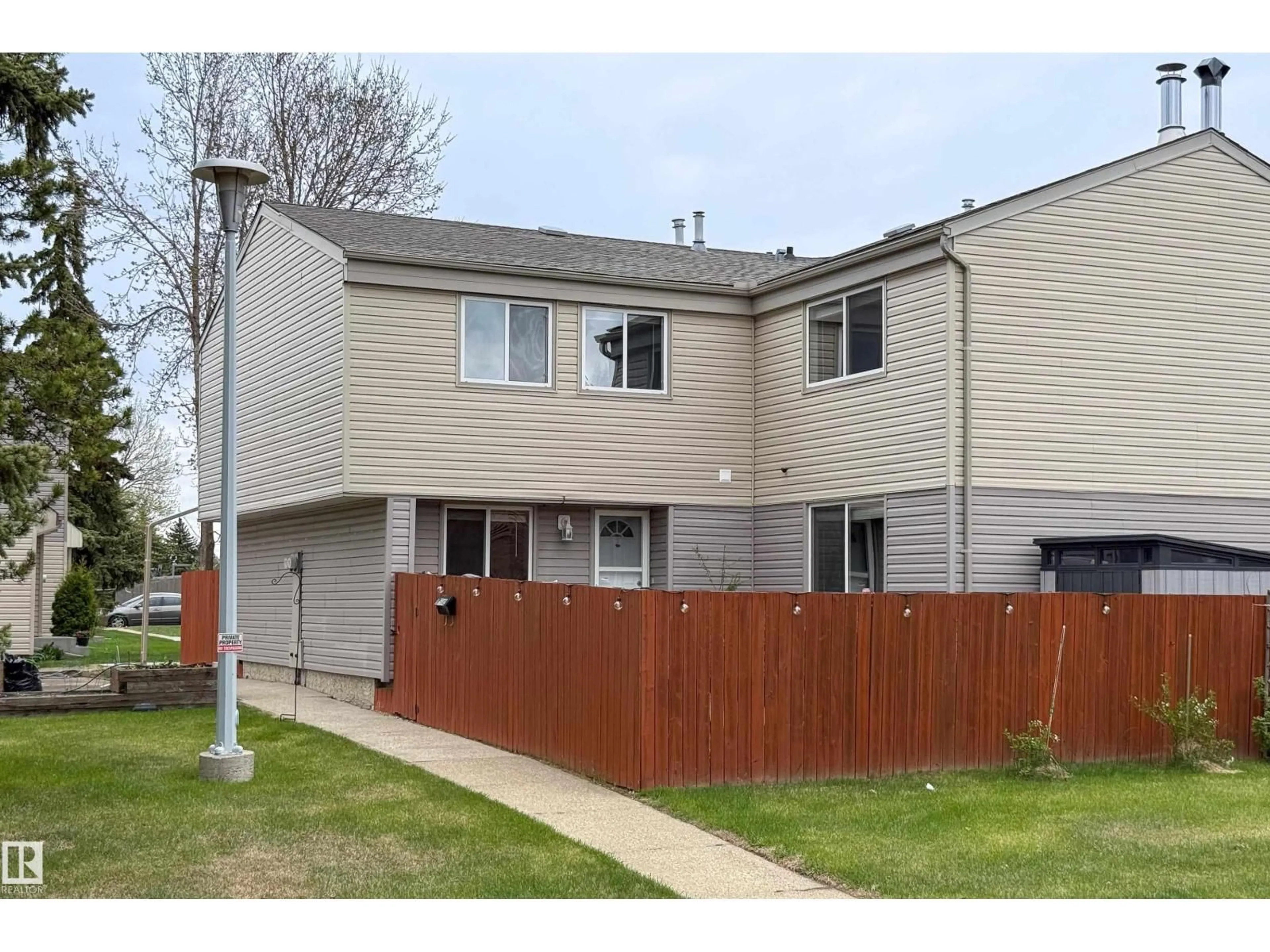 Home with vinyl exterior material, street for NW - 5642 148 ST, Edmonton Alberta T6H4T8