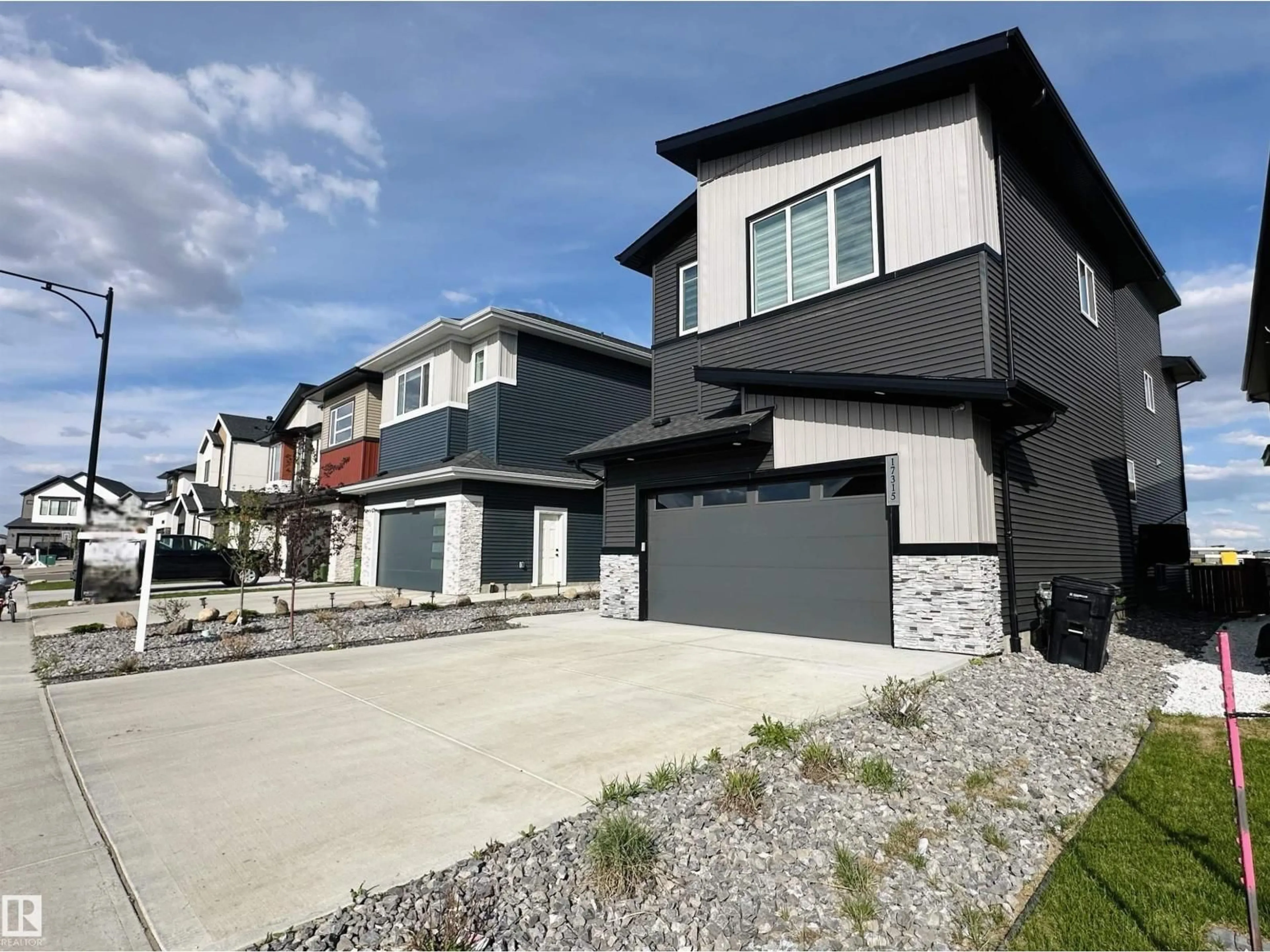 Home with vinyl exterior material, street for NW - 17315 68 ST, Edmonton Alberta T5Z0W4