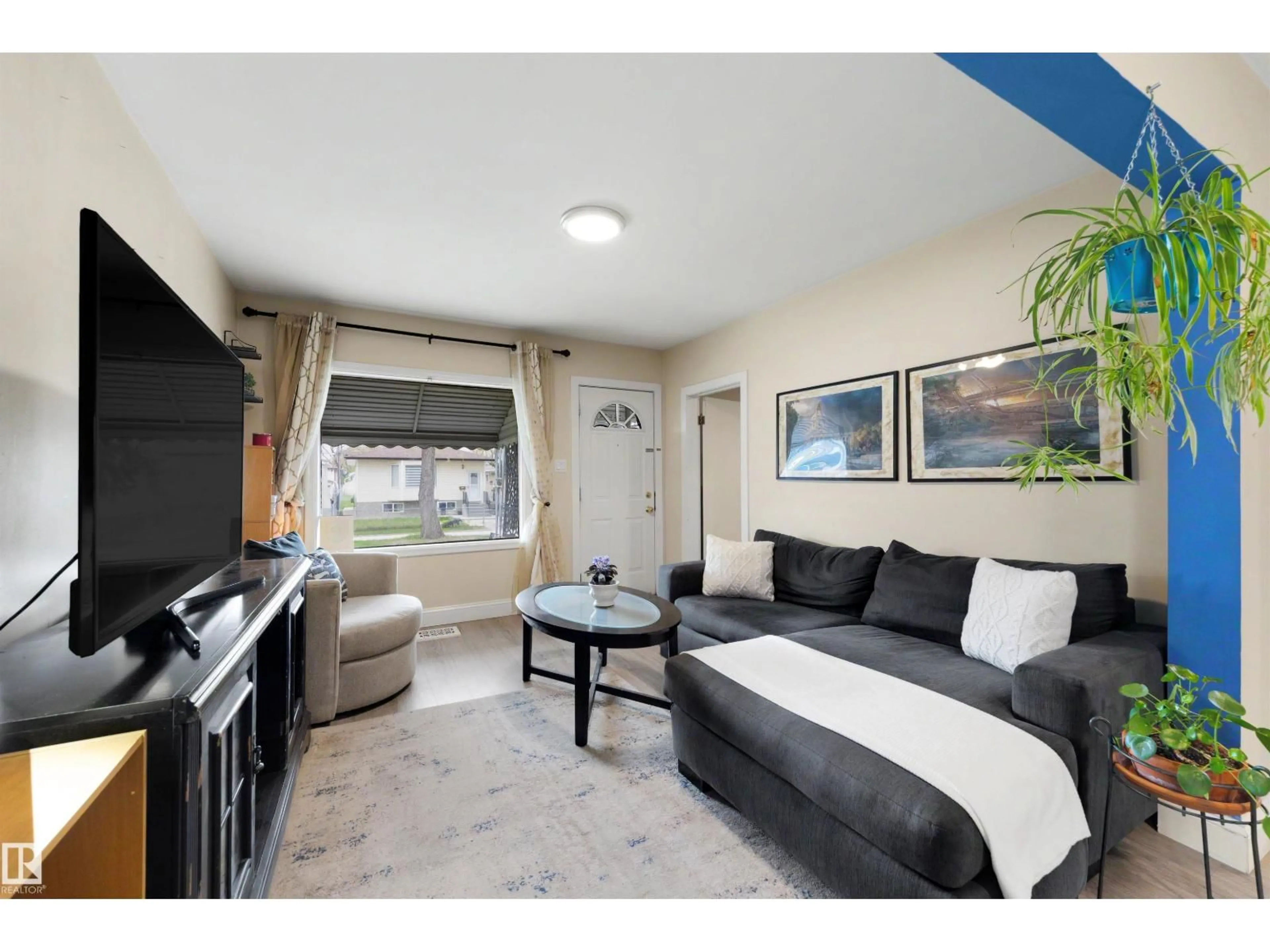 Living room with furniture, unknown for 11417 91 ST, Edmonton Alberta T5B4A6