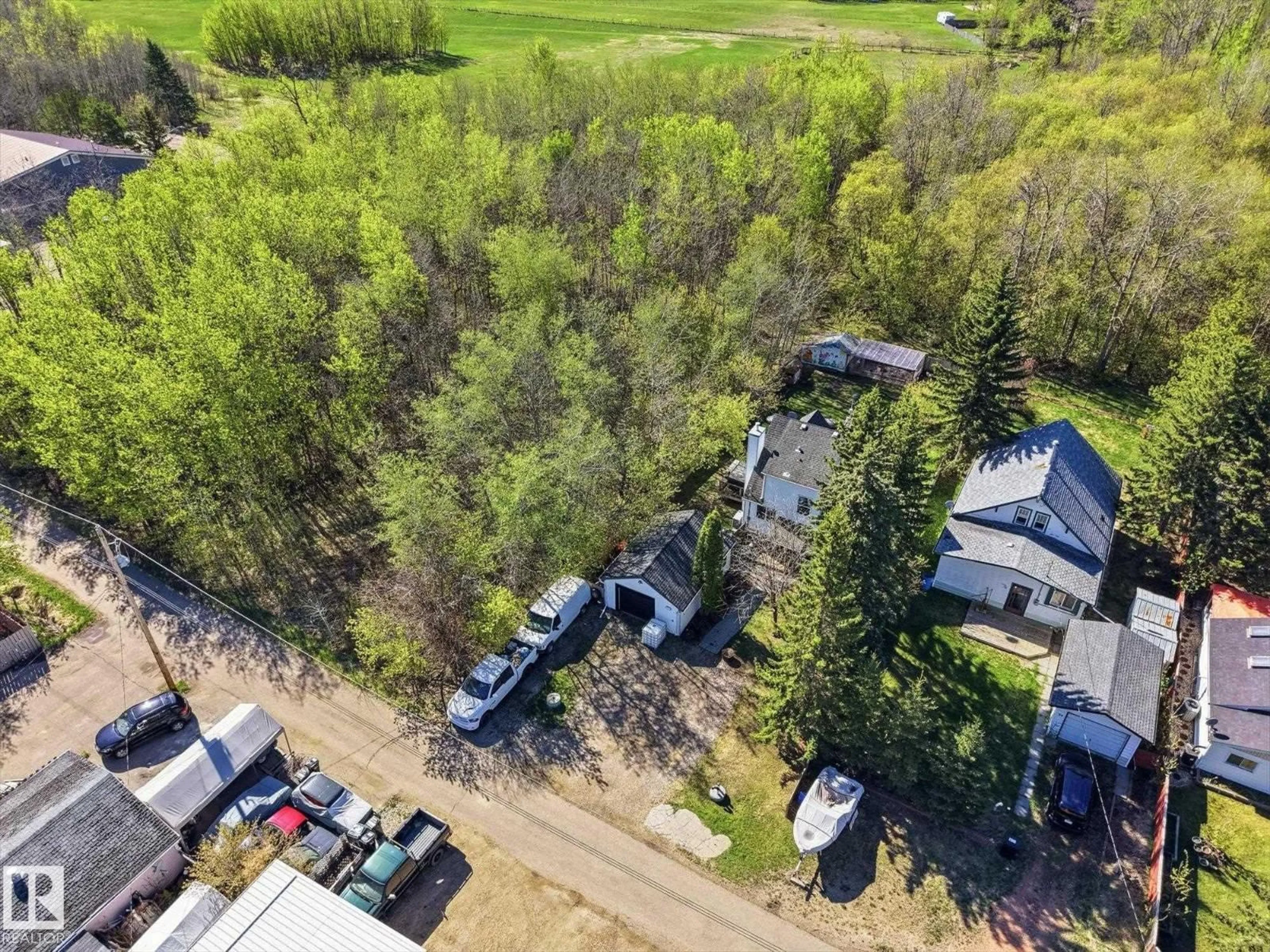 A pic from outside/outdoor area/front of a property/back of a property/a pic from drone, forest/trees view for 92 COOKING LAKE RD, Rural Strathcona County Alberta T8E1J1